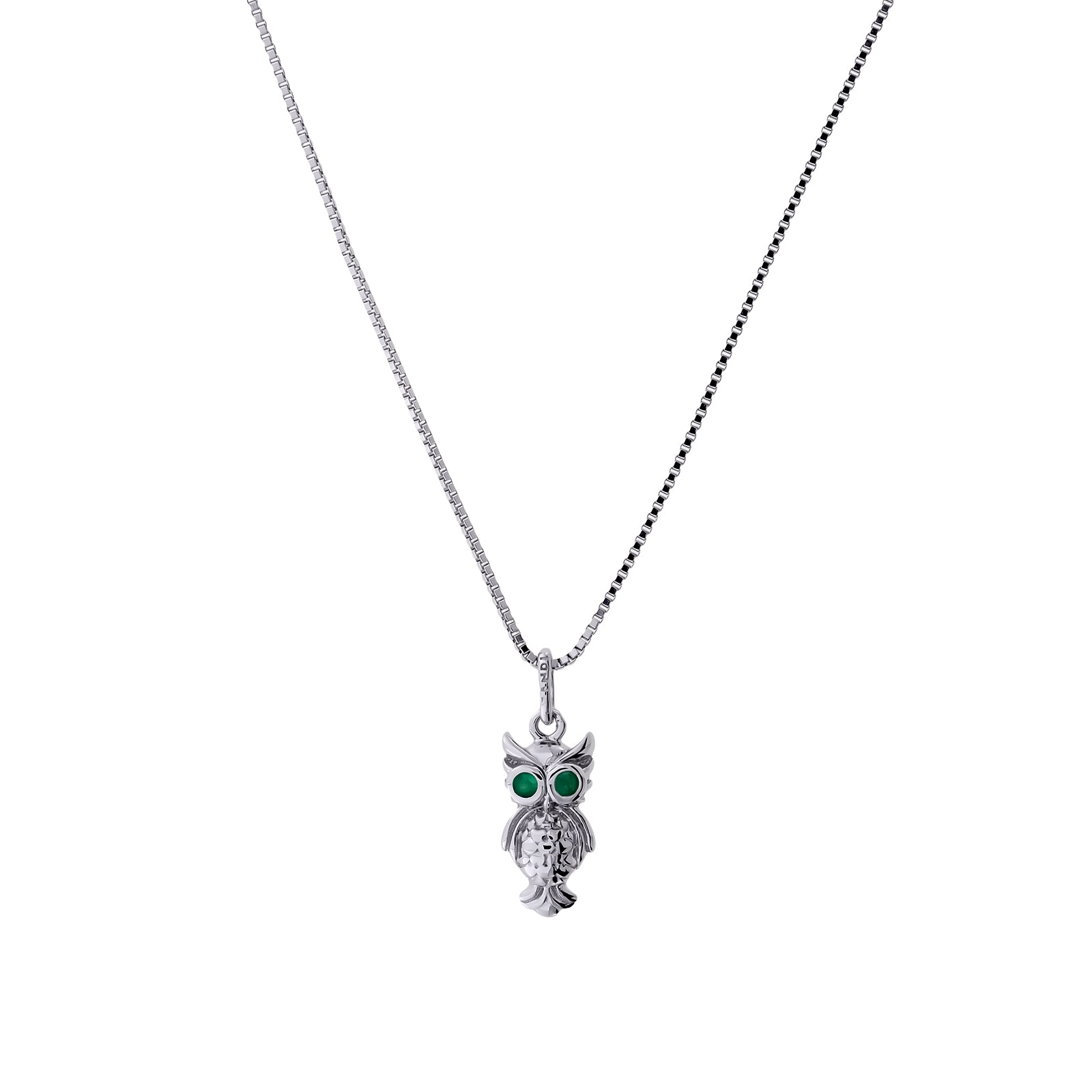 Sterling silver owl pendant featuring vibrant emerald eyes, suspended from a delicate chain, showcasing a sculptural design with contemporary elegance.