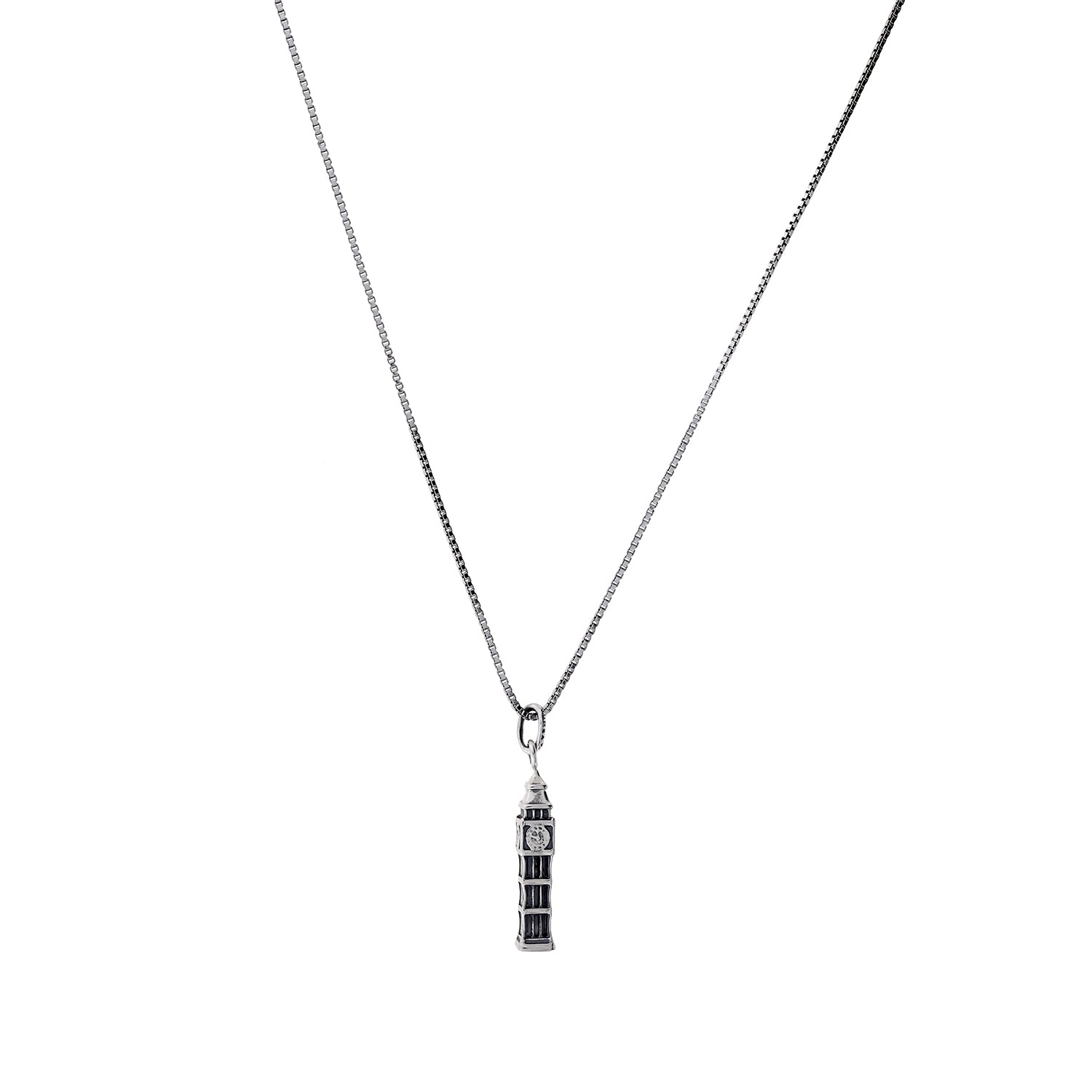 Sterling silver pendant designed as a detailed miniature landmark tower suspended from a fine chain, showcasing contemporary British silver jewellery design.