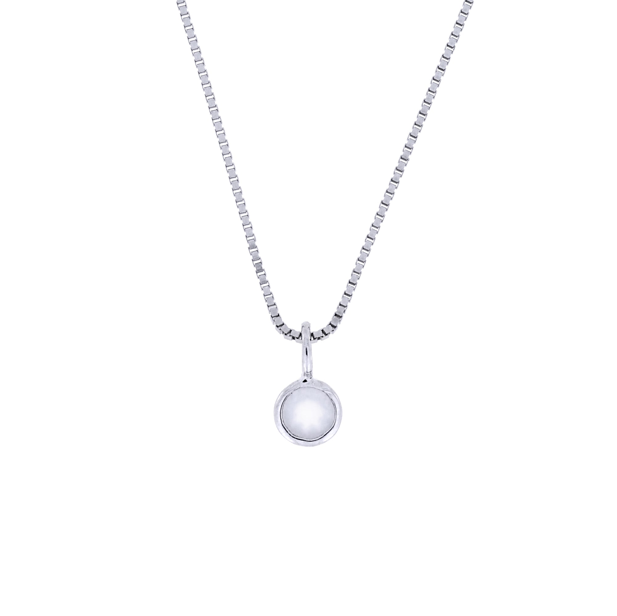 Delicate sterling silver pendant featuring a polished aqua chalcedony birthstone, suspended on a sleek box chain, exemplifying refined British craftsmanship.