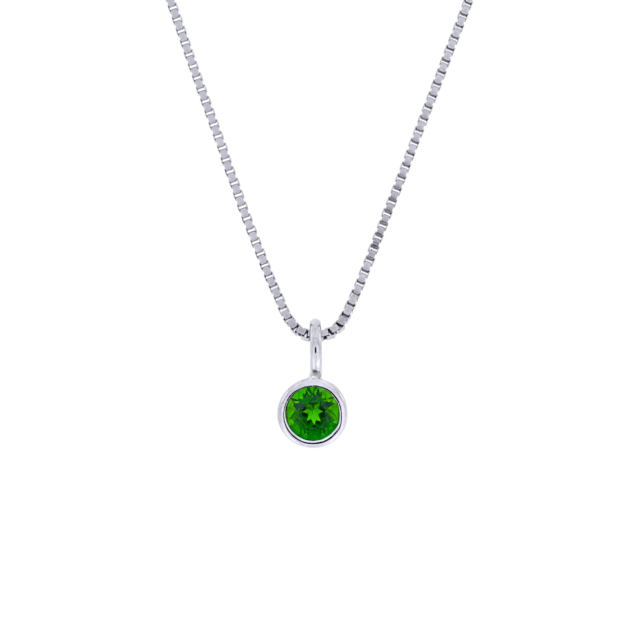 Sterling silver pendant featuring a vivid green Siberian emerald birthstone, suspended on a fine chain showcasing expert British craftsmanship and elegant simplicity.