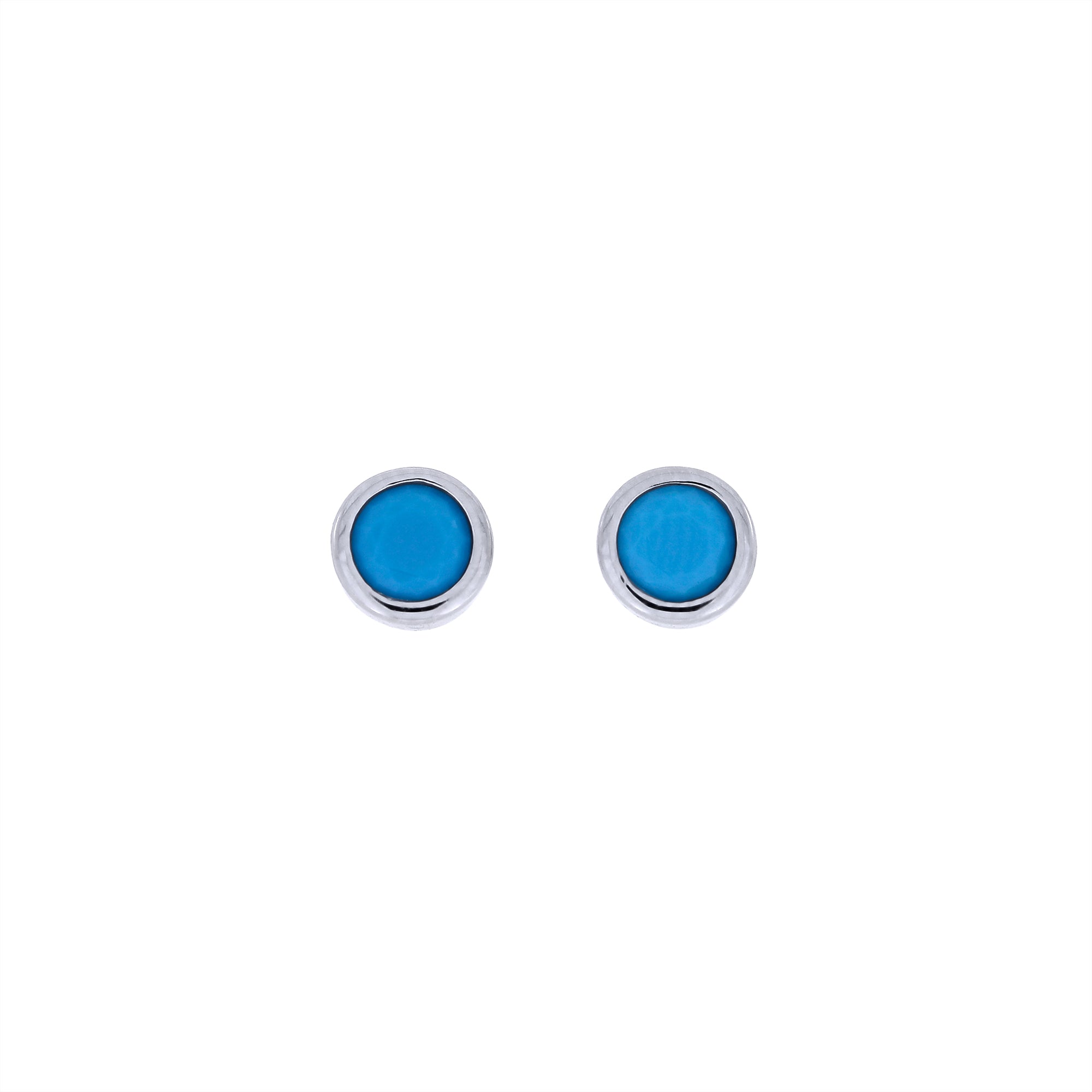 Round turquoise gemstone earrings set in polished sterling silver bezel mounts, showcasing a sleek and contemporary design with expert British craftsmanship.