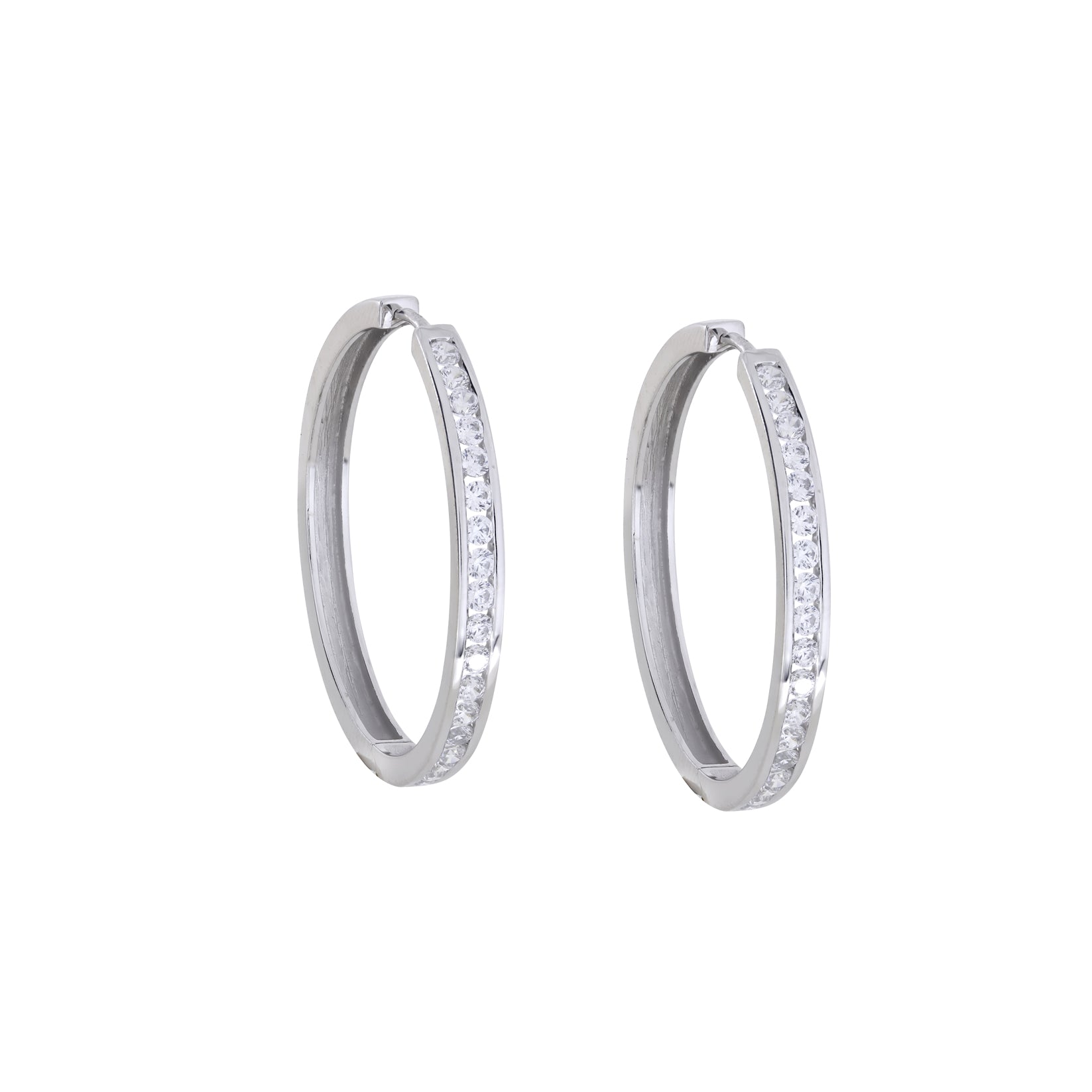 Pair of sterling silver hoop earrings featuring a hinged design and a row of large, sparkling stones set along the front for a refined, contemporary look.