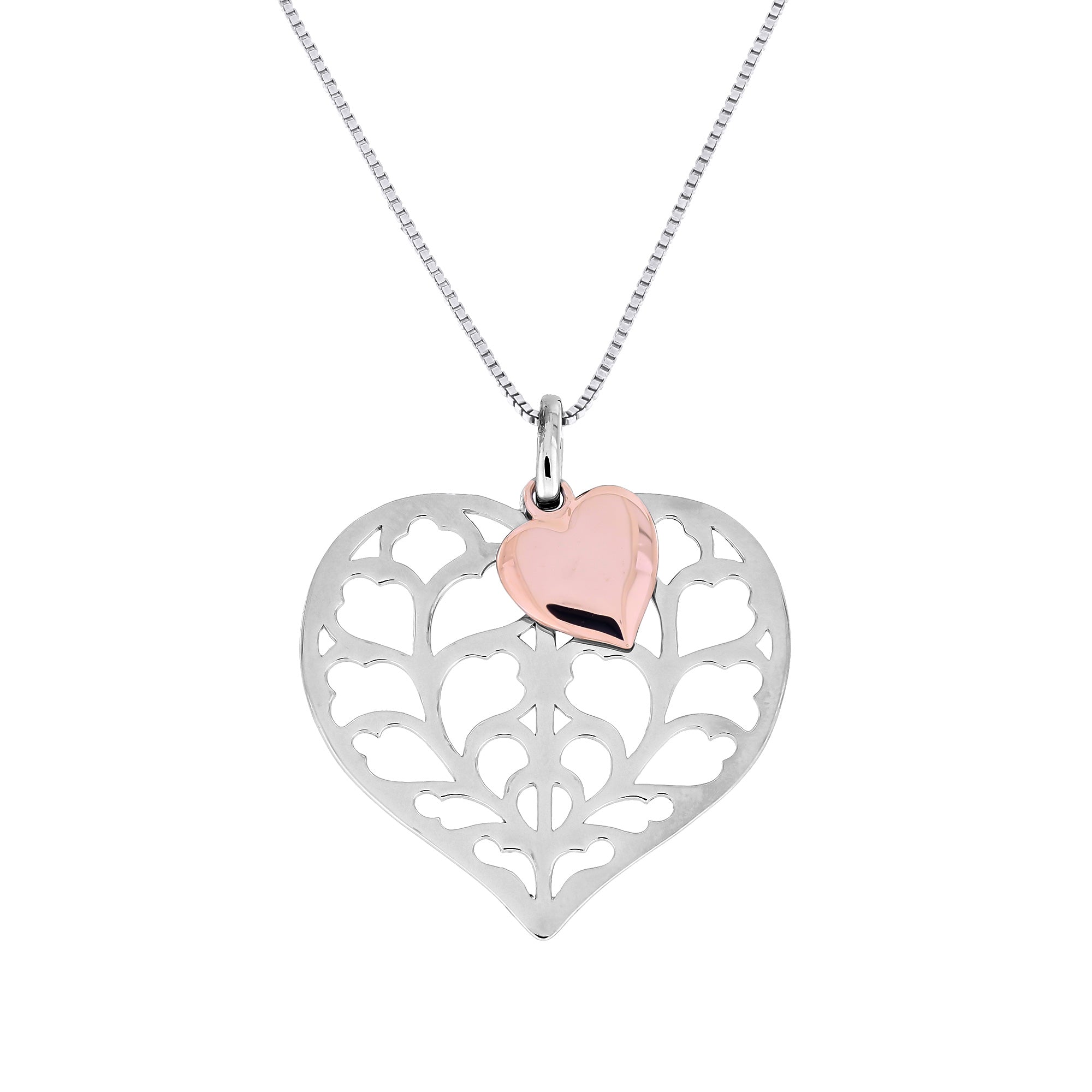 Sterling silver necklace featuring a sculptural openwork heart pendant accented with a small rose gold vermeil heart, suspended on a fine chain for elegant wear.