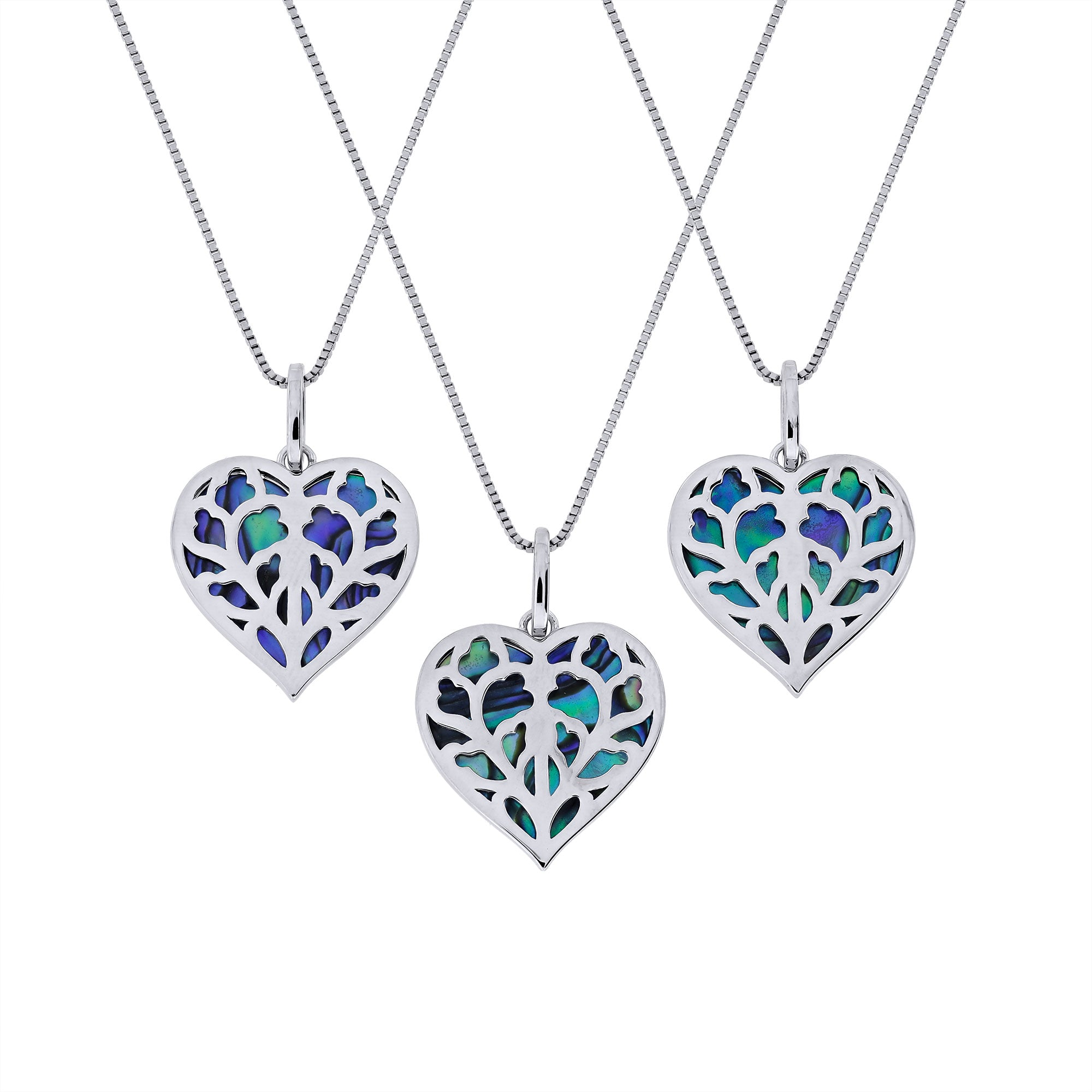 Three sterling silver heart-shaped pendant with intricate York Minster stonework design filled with iridescent abalone shell, suspended on a fine silver chain for elegant wear.