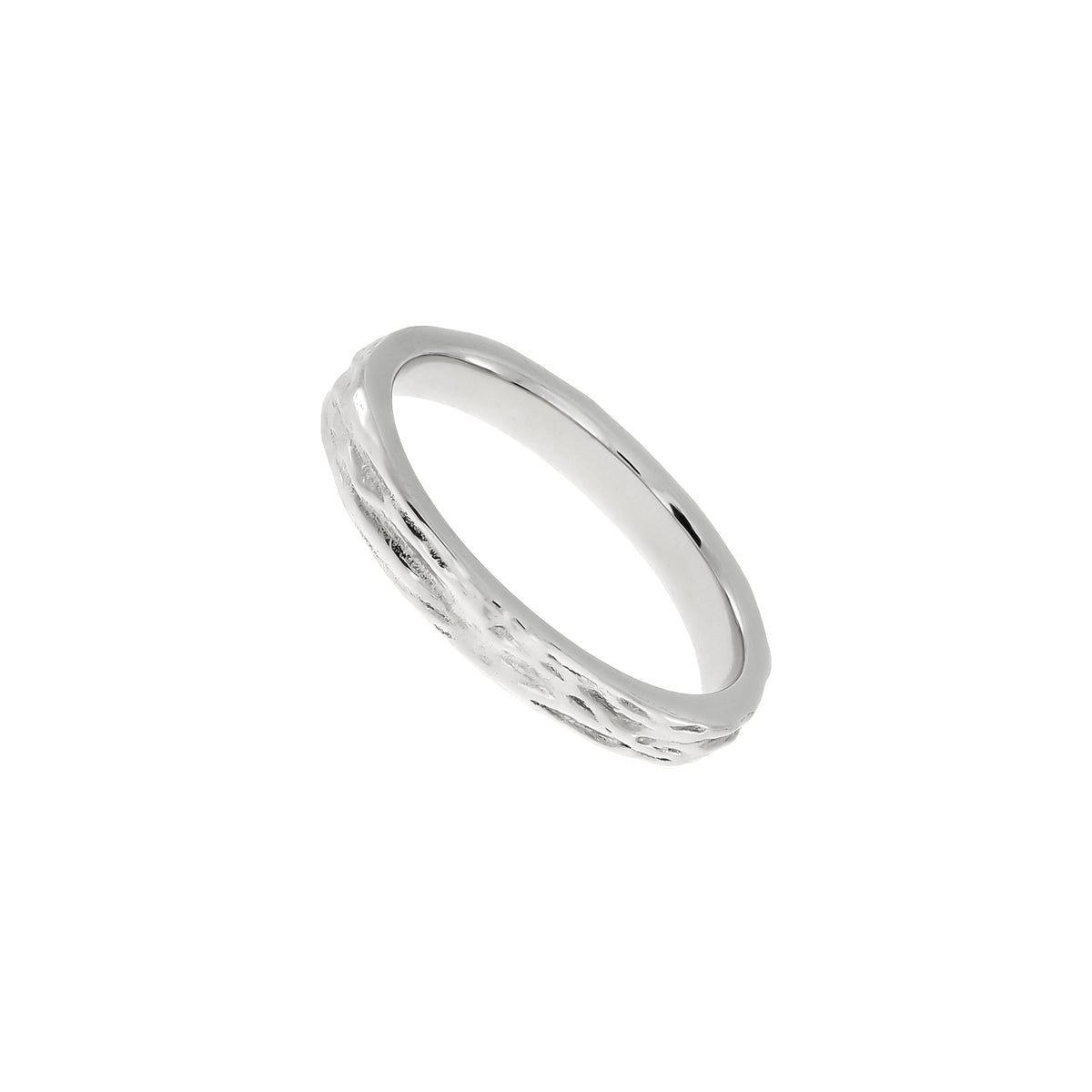 Delicate sterling silver ring featuring a textured wave design with a smooth interior, showcasing a sculptural and contemporary aesthetic in handcrafted silver jewellery.