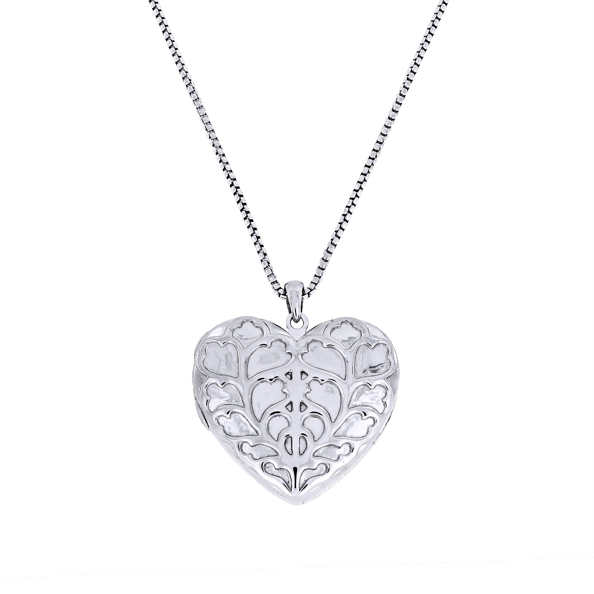 Sterling silver heart-shaped locket pendant featuring intricate openwork detailing, suspended on a fine chain, showcasing expert British craftsmanship and elegant design.