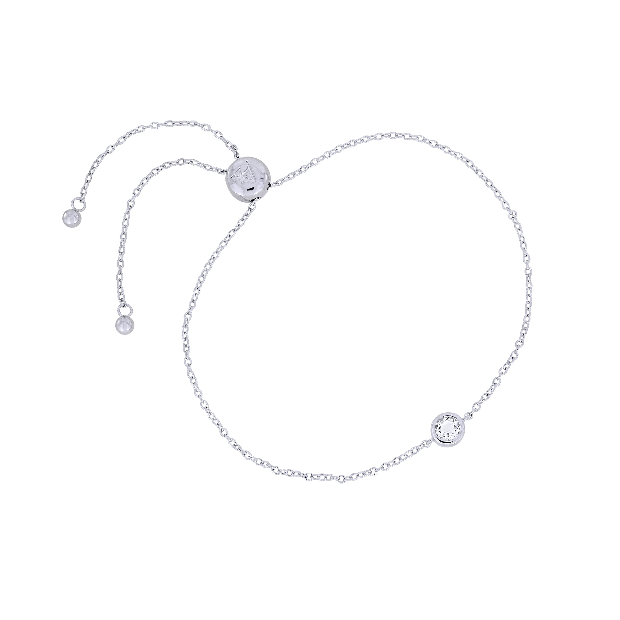 Adjustable sterling silver bracelet featuring a bezel-set white topaz stone with a sliding clasp, exemplifying refined British craftsmanship and contemporary design.