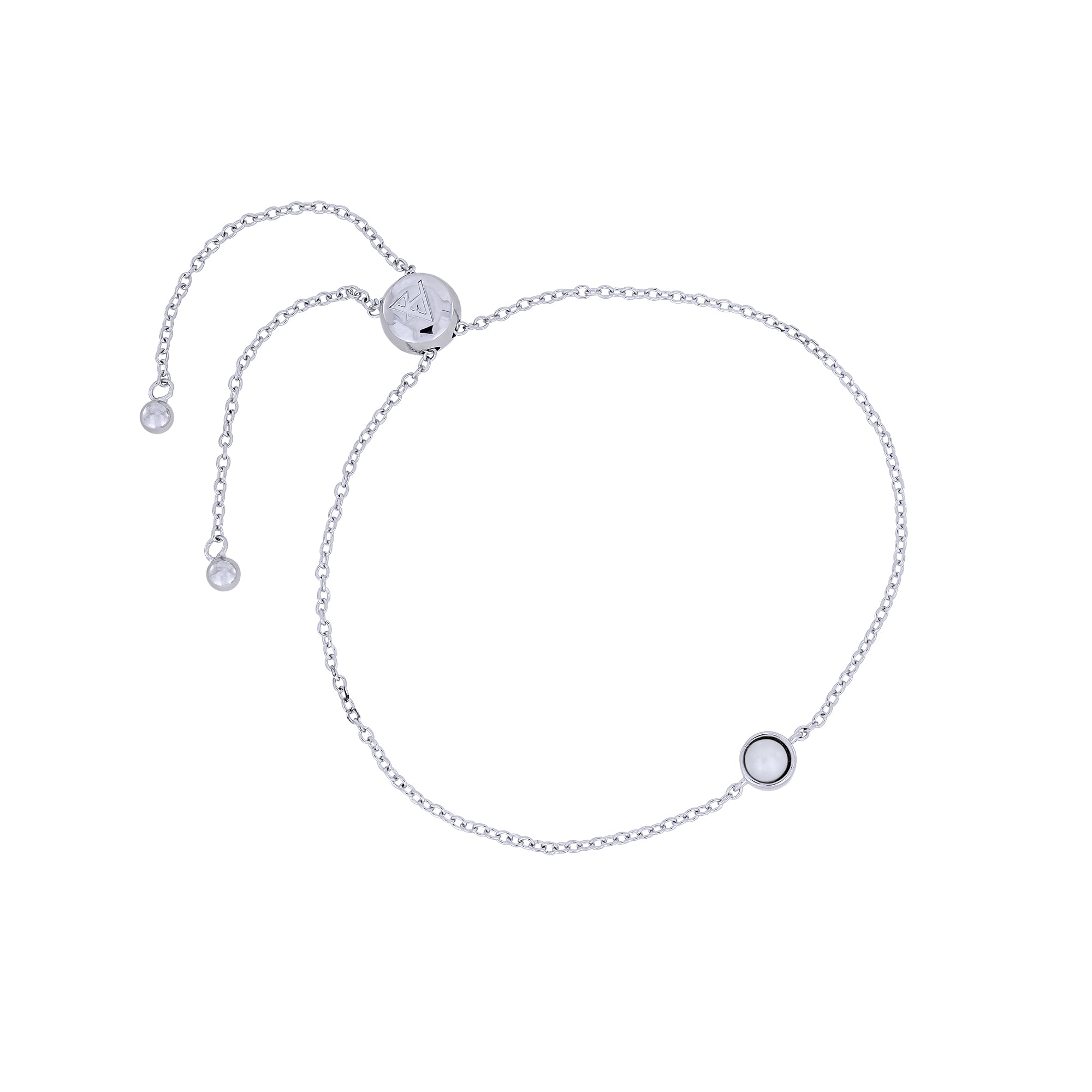 Adjustable sterling silver bracelet featuring a single freshwater pearl set within a sleek bezel, exemplifying refined British craftsmanship and contemporary design.