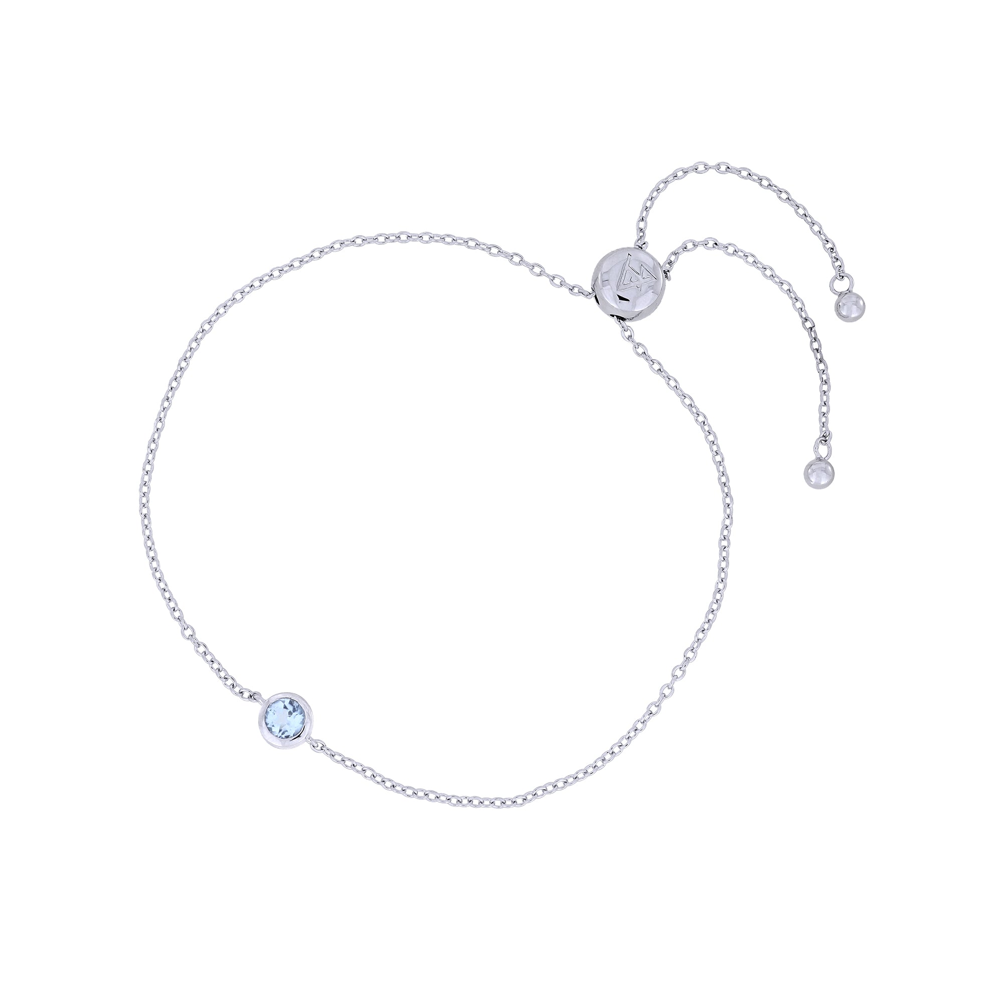 Adjustable sterling silver bracelet featuring a bezel-set blue topaz gemstone, designed with a sliding clasp for a sleek, contemporary look.