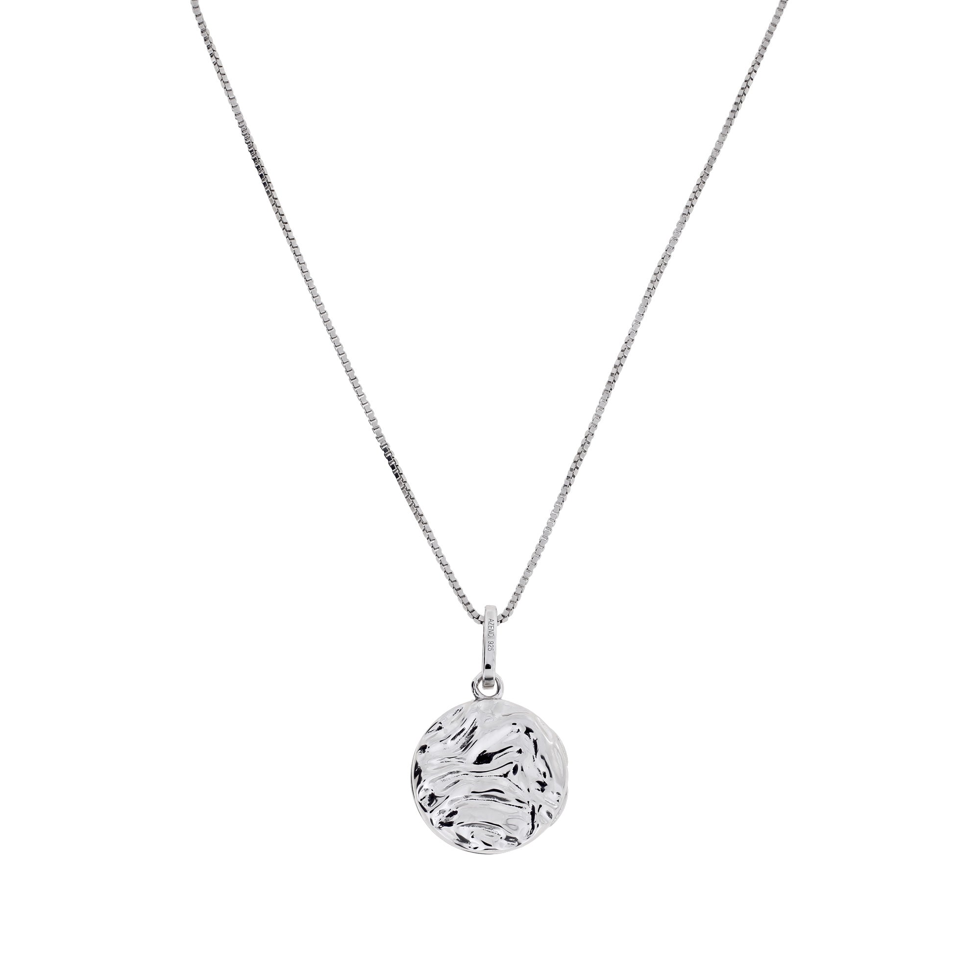 Sterling silver pendant with a textured wave design, suspended from a fine adjustable chain, exemplifying contemporary and sculptural silver jewellery craftsmanship.