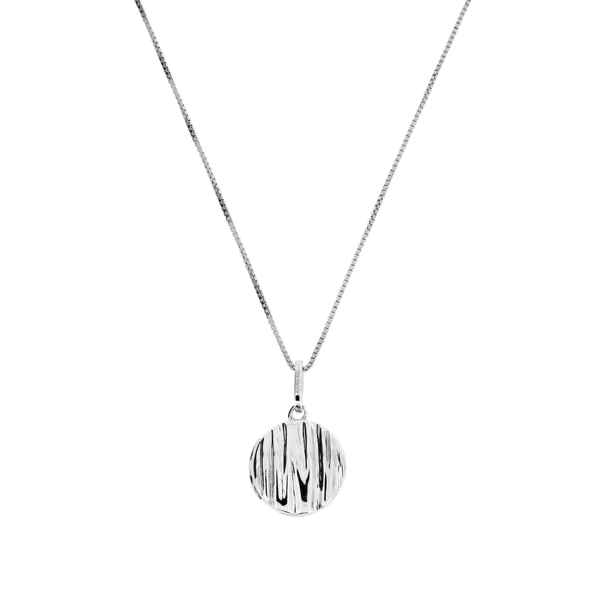 Sterling silver pendant with textured grooved surface hanging from a fine adjustable chain, showcasing a modern and sculptural design in silver jewellery.