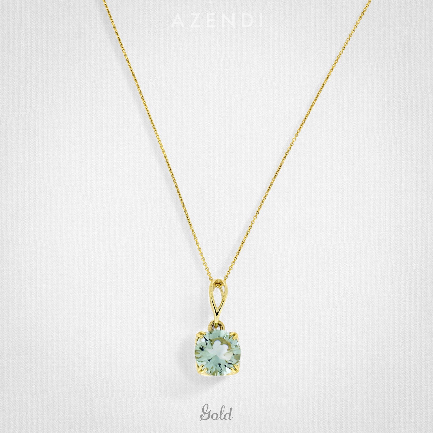 A refined 9 carat gold pendant featuring a solitaire green amethyst with a delicate chain, showcasing a timeless and elegant design by Azendi.