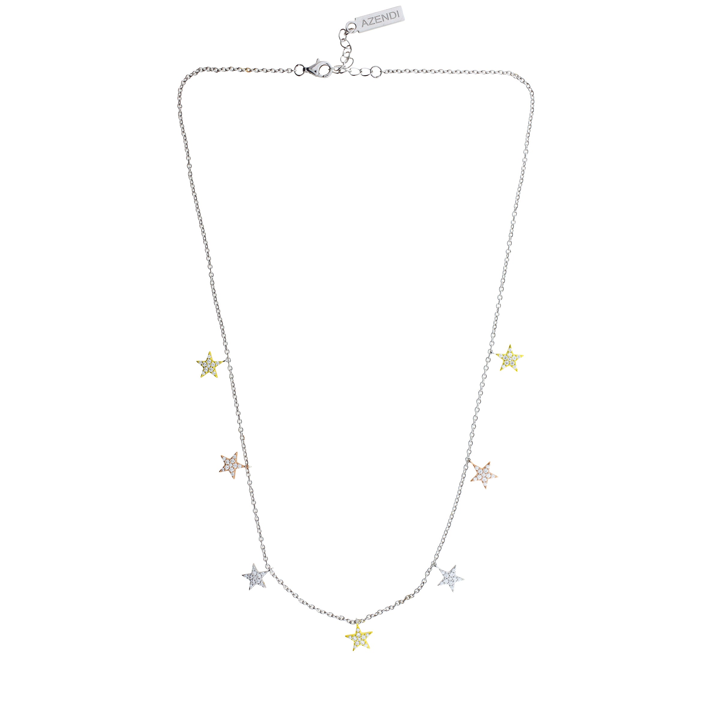 Delicate mixed vermeil necklace featuring seven pavé-set star charms spaced along a fine sterling silver chain with adjustable length, presented on a white background.