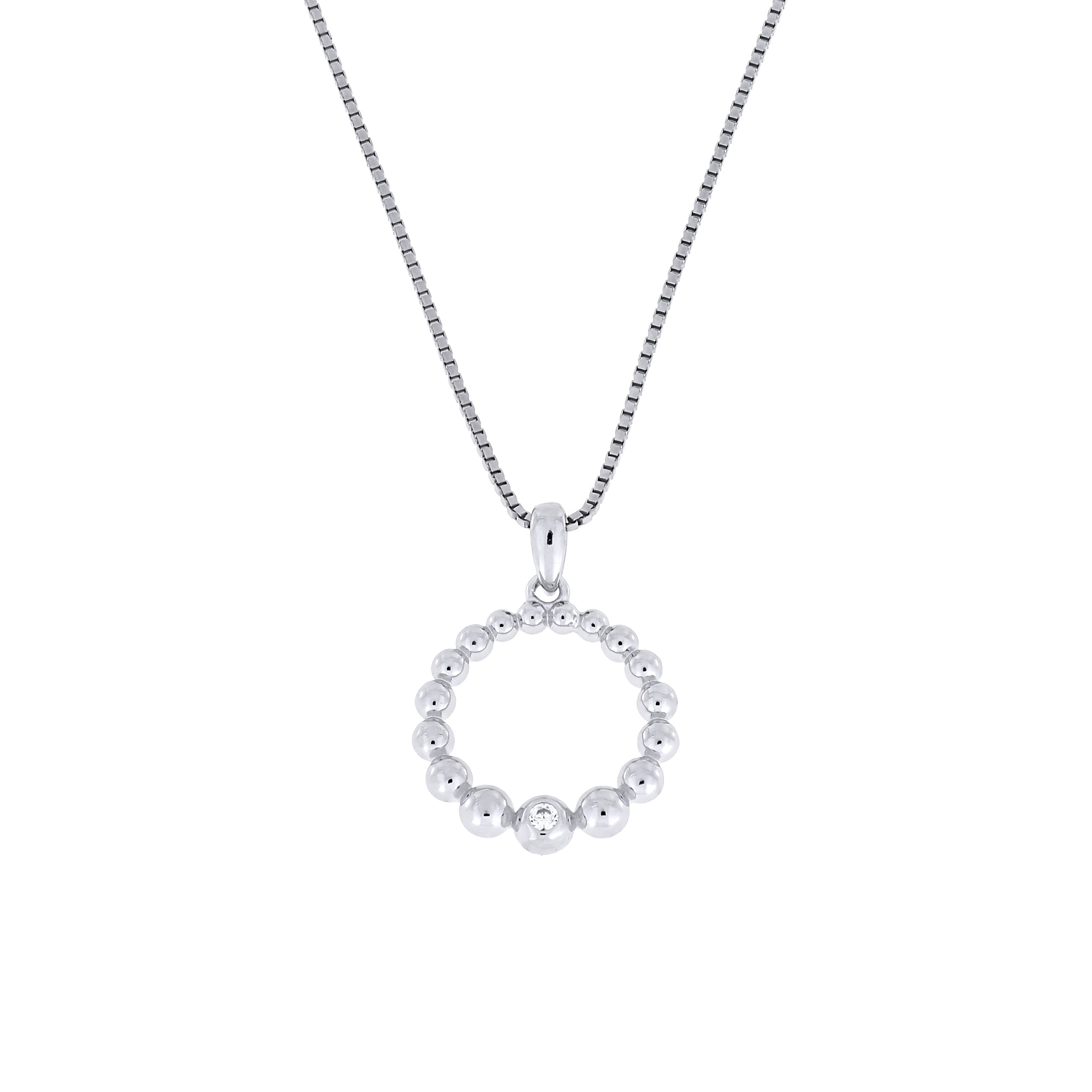 Sterling silver pendant featuring graduated beaded circle design accented with a single cubic zirconia, suspended on a fine delicate chain, showcasing expert British craftsmanship.