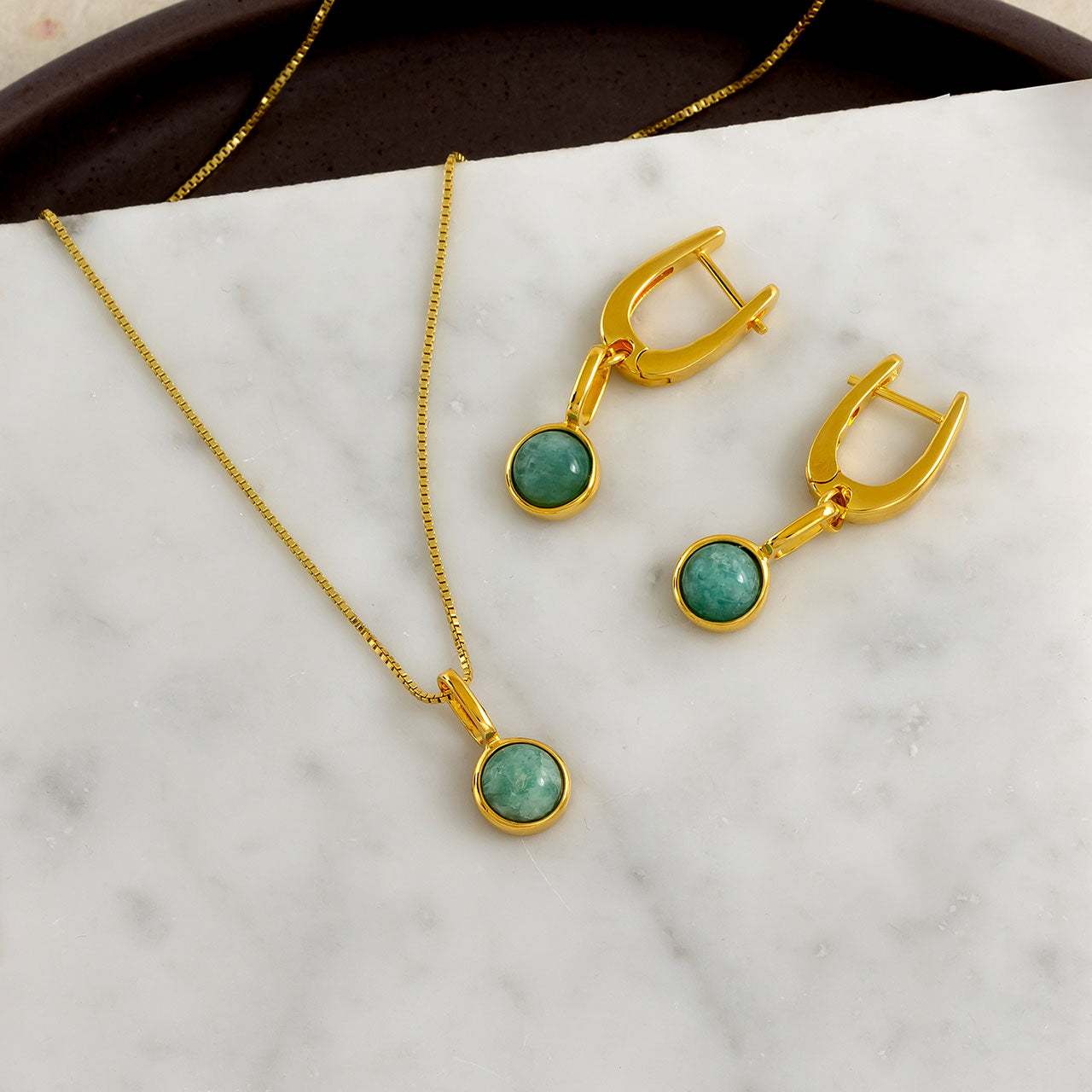 Gold vermeil pendant and matching hoop earrings set with round amazonite stones, showcasing a refined and modern design in designer gold vermeil jewellery.