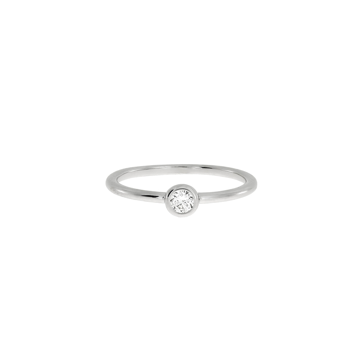 Minimalist sterling silver ring featuring a bezel-set lab grown diamond solitaire, showcasing a sleek and contemporary design from a British jeweller.