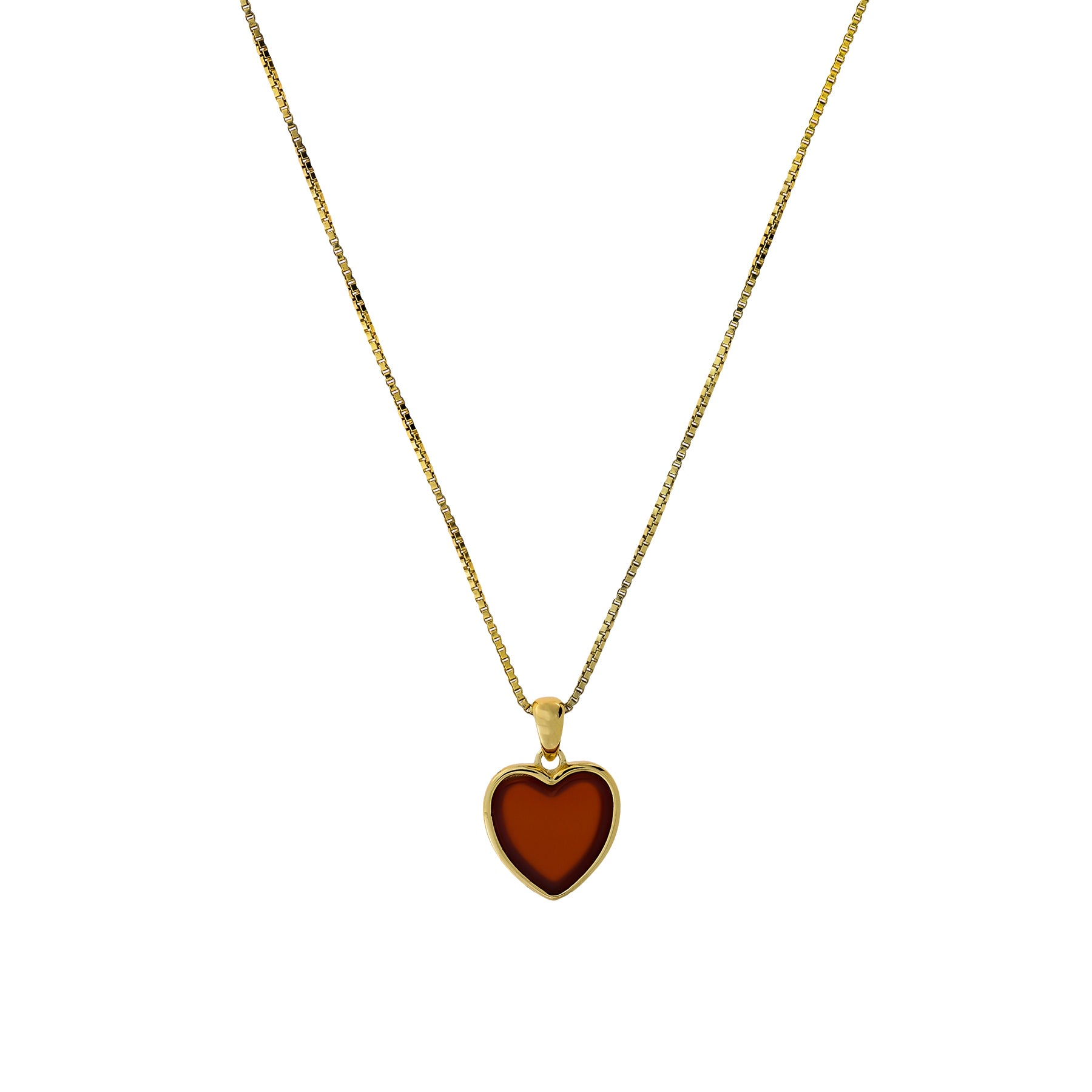 Delicate gold vermeil necklace featuring a heart-shaped red agate pendant suspended on a fine chain, showcasing elegant, sculptural jewellery design by Azendi.