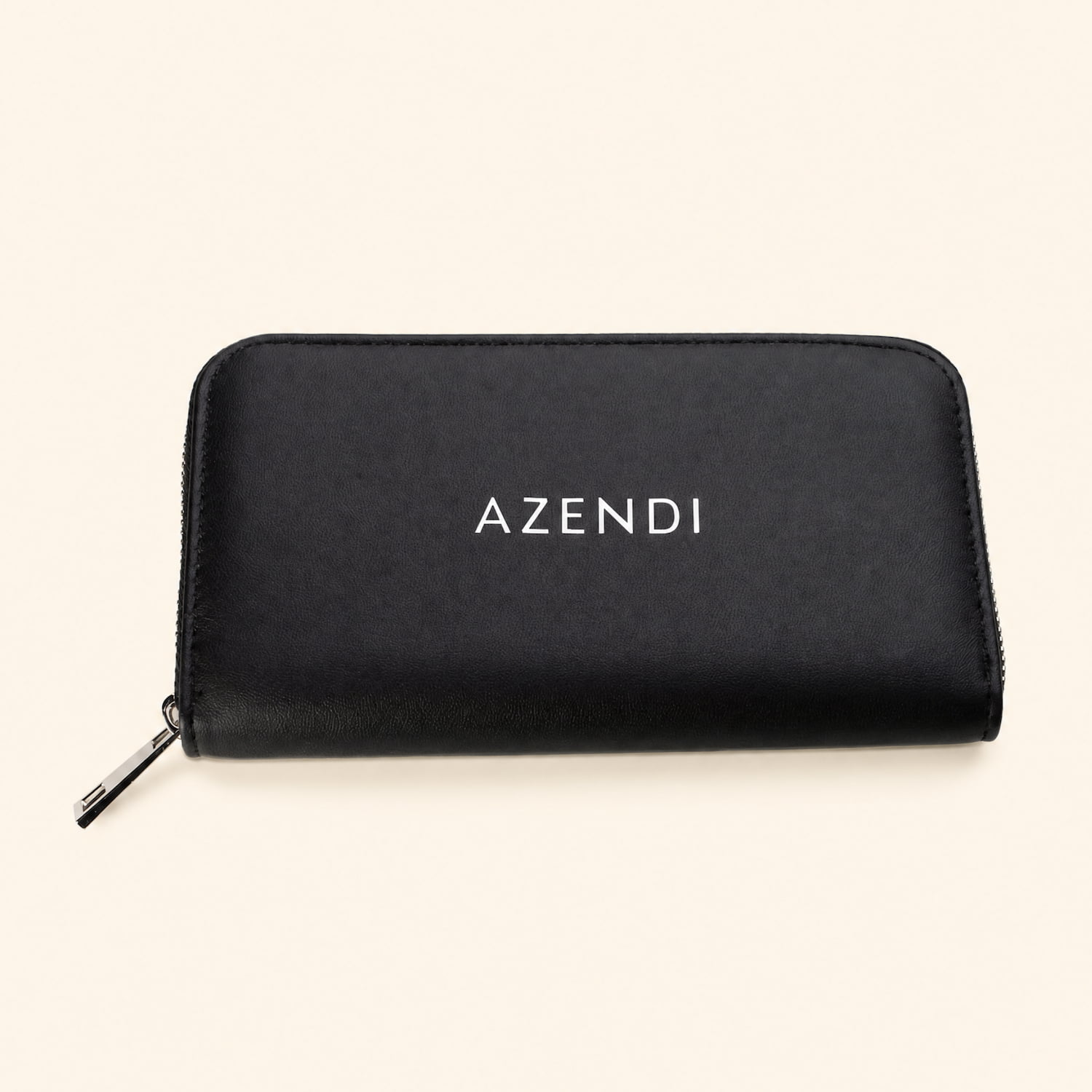 Black jewellery travel wallet crafted from PU leather with velvet and foam details, featuring a zip closure and the Azendi logo on the front.