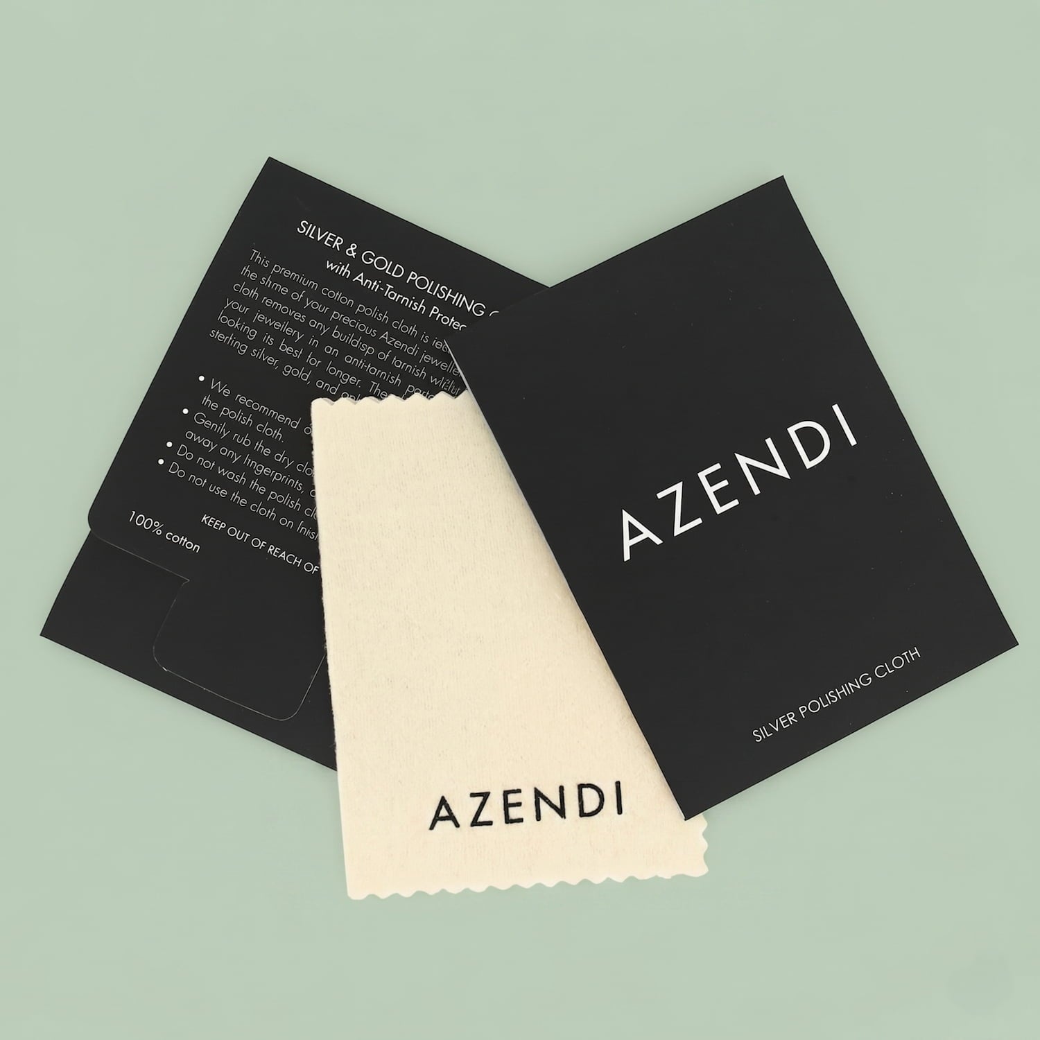 A jewellery polishing cloth with 'AZENDI' branding, presented in a black packaging with white text.