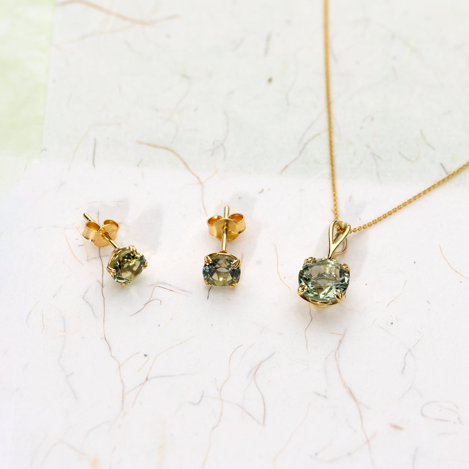 9 Carat Gold Green Amethyst Solitaire Earrings