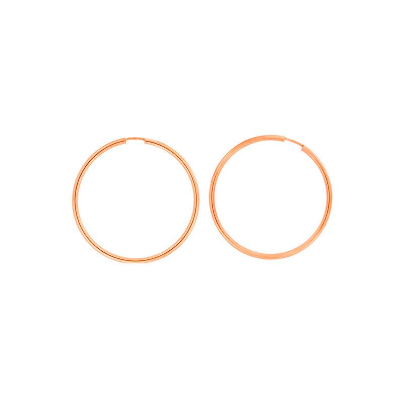 Pair of smooth, polished sterling silver hoop earrings measuring 4cm in diameter, showcasing a timeless, minimalist design by an award-winning British jeweller.