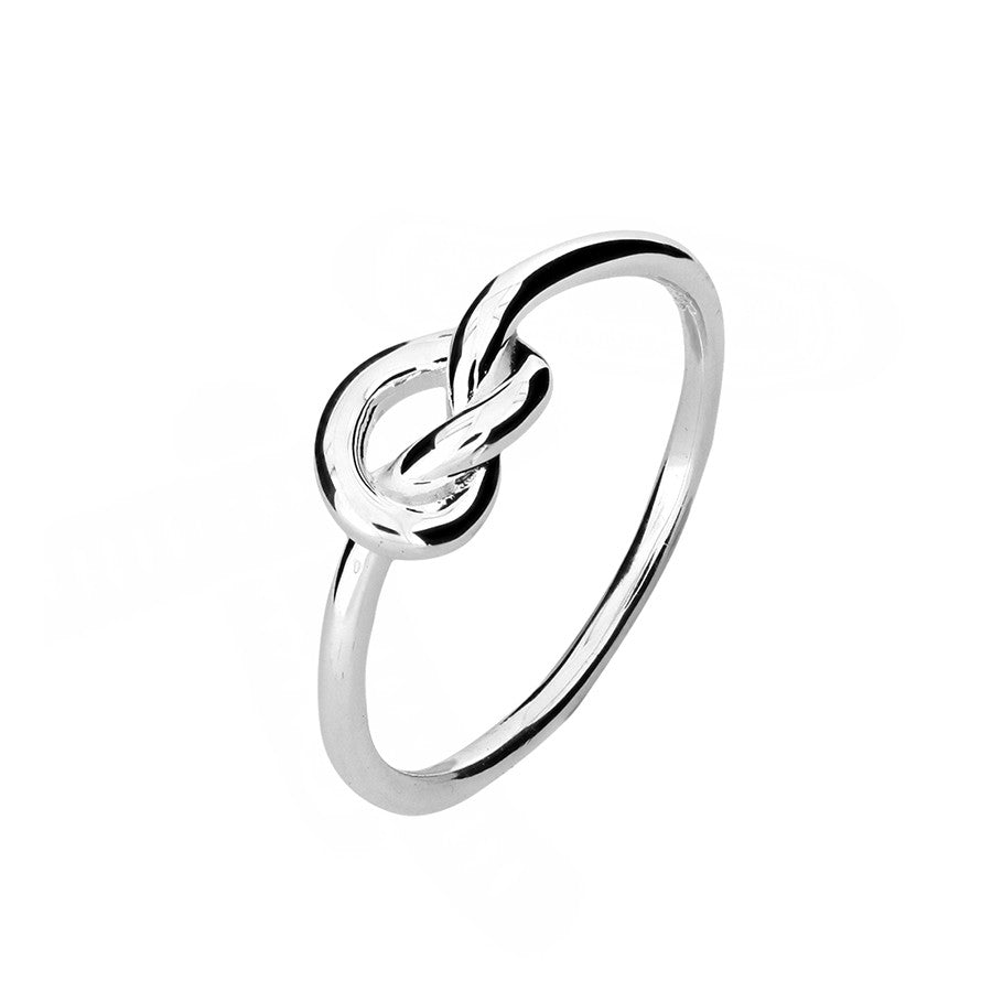 Sterling silver ring featuring a polished knot design with a delicate band, showcasing contemporary elegance and sculptural simplicity in fine silver jewellery.