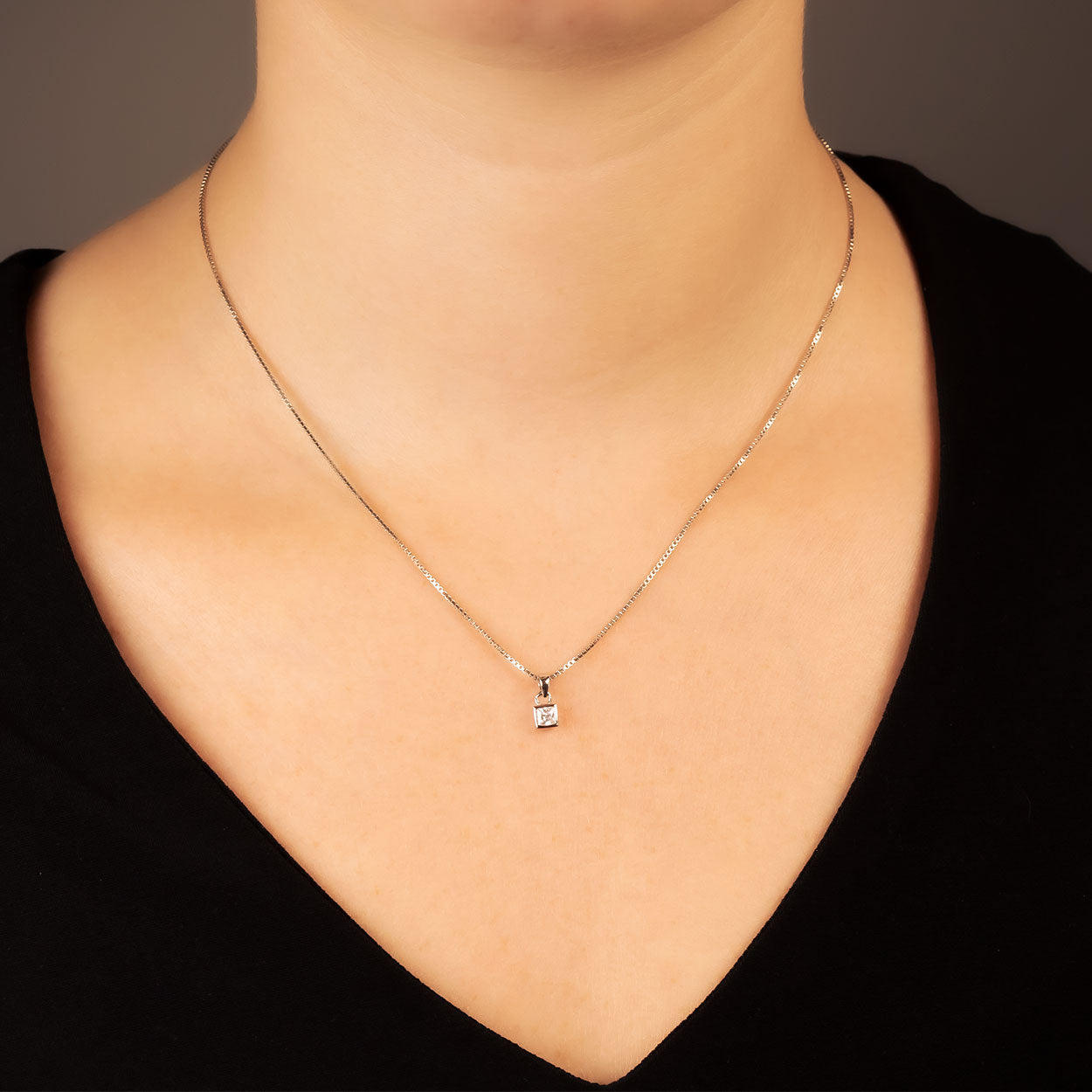 Mini Princess Cut Cubic Zirconia Pendant with a Rub-over Setting