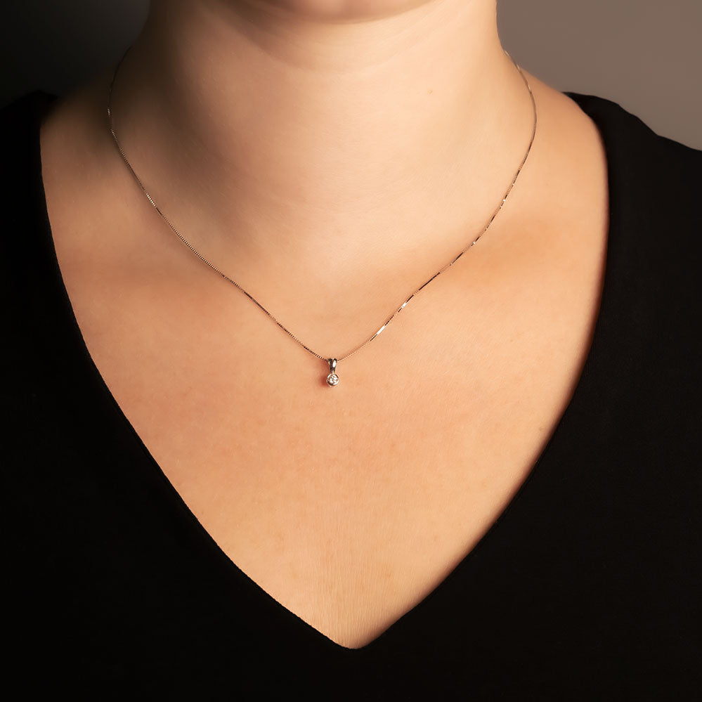 9 Carat White Gold & Diamond Solitaire Pendant (0.07ct Diamond)