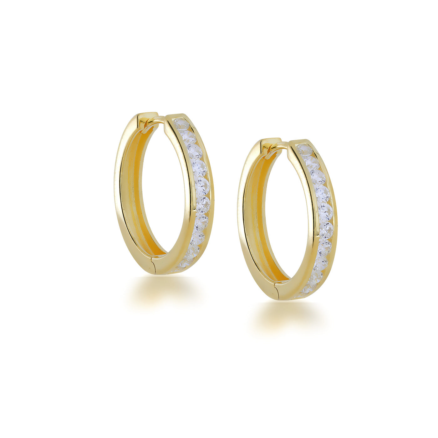 Elegant medium-sized gold vermeil hoop earrings featuring a row of sparkling stones set along the outer edge, showcasing refined contemporary silver jewellery design.