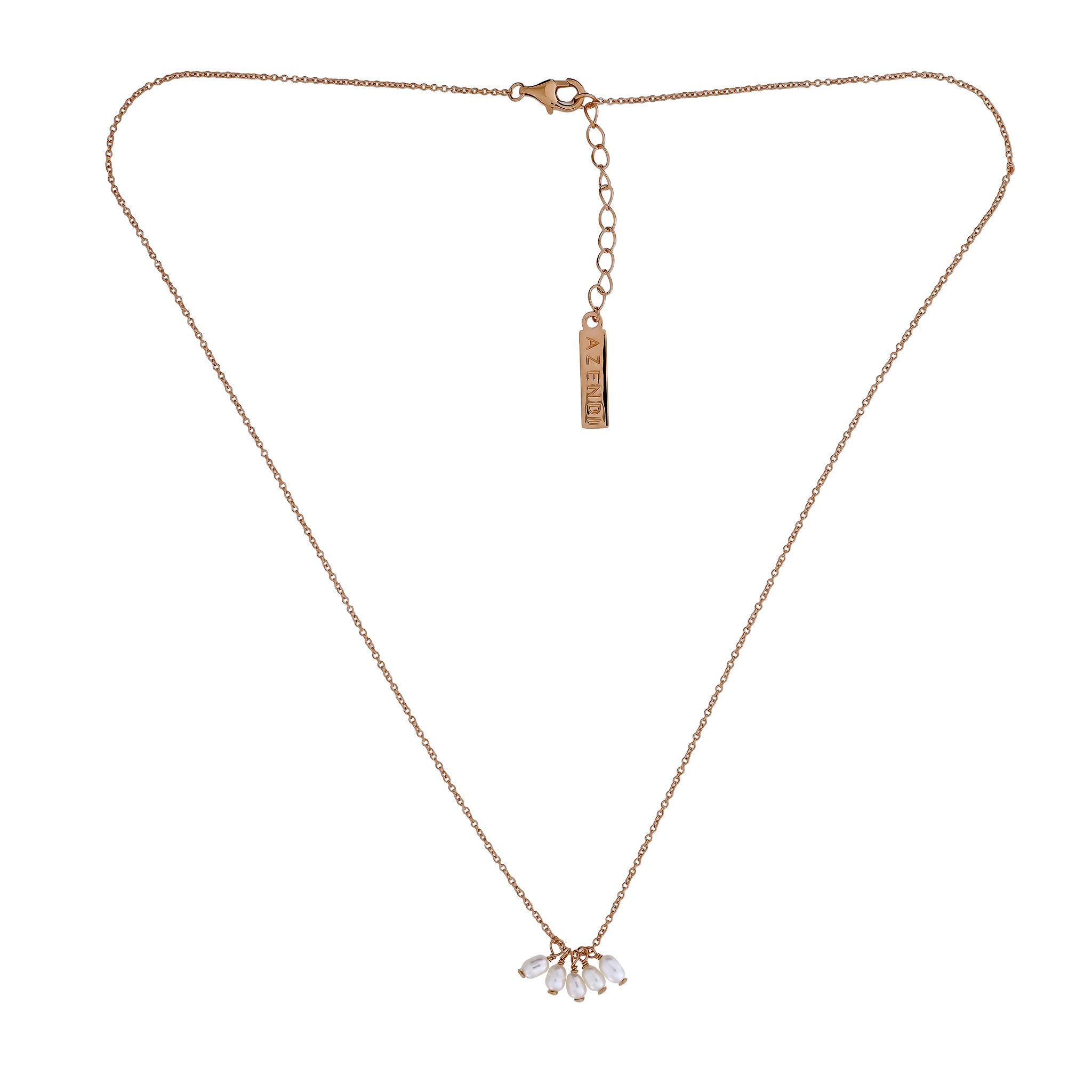 Delicate rose gold vermeil necklace featuring a cluster of lustrous freshwater pearls suspended from a fine chain, offering a refined and contemporary sterling silver jewellery style.