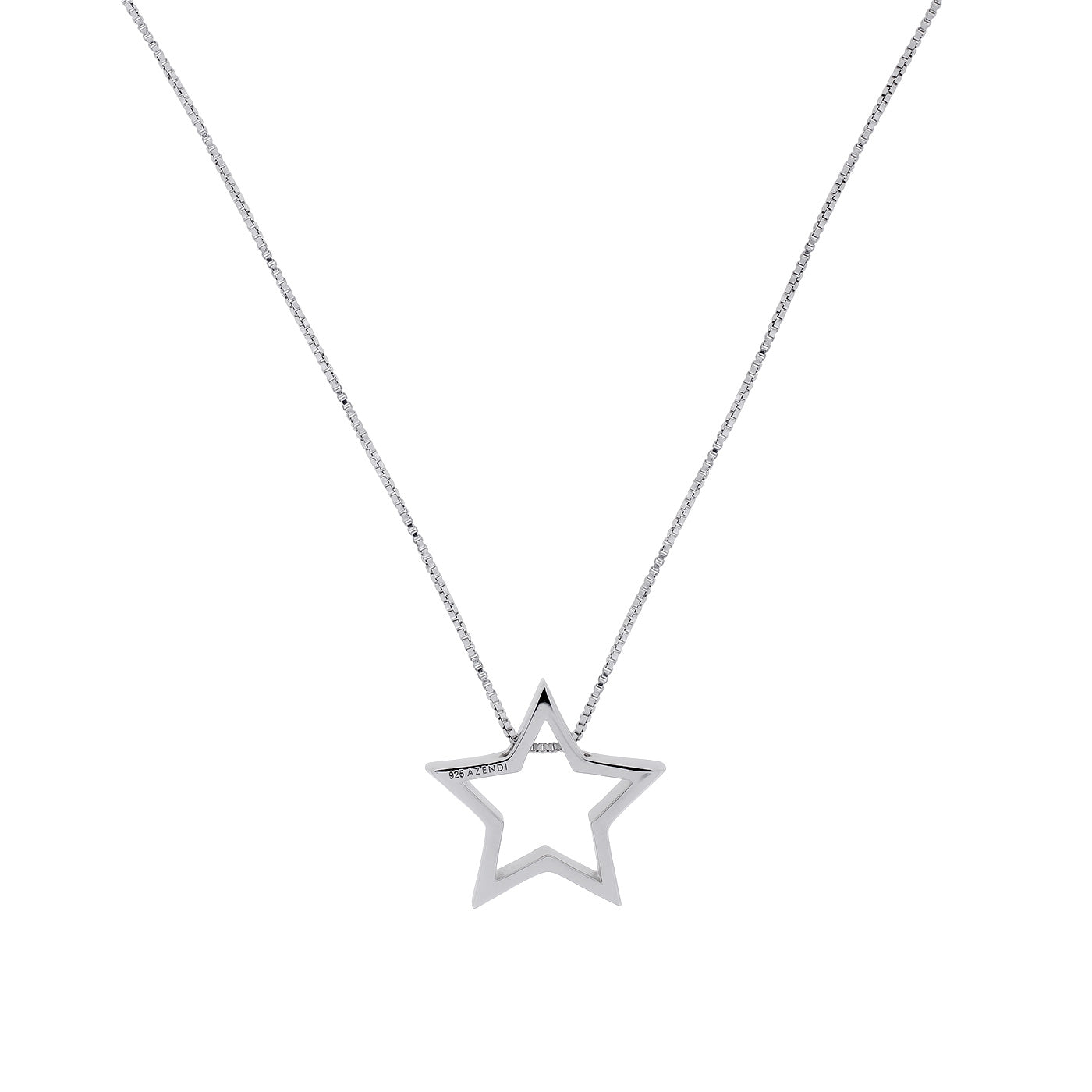 Delicate sterling silver necklace featuring a sculptural open star pendant with clean lines, suspended from a fine chain reflecting contemporary British design.