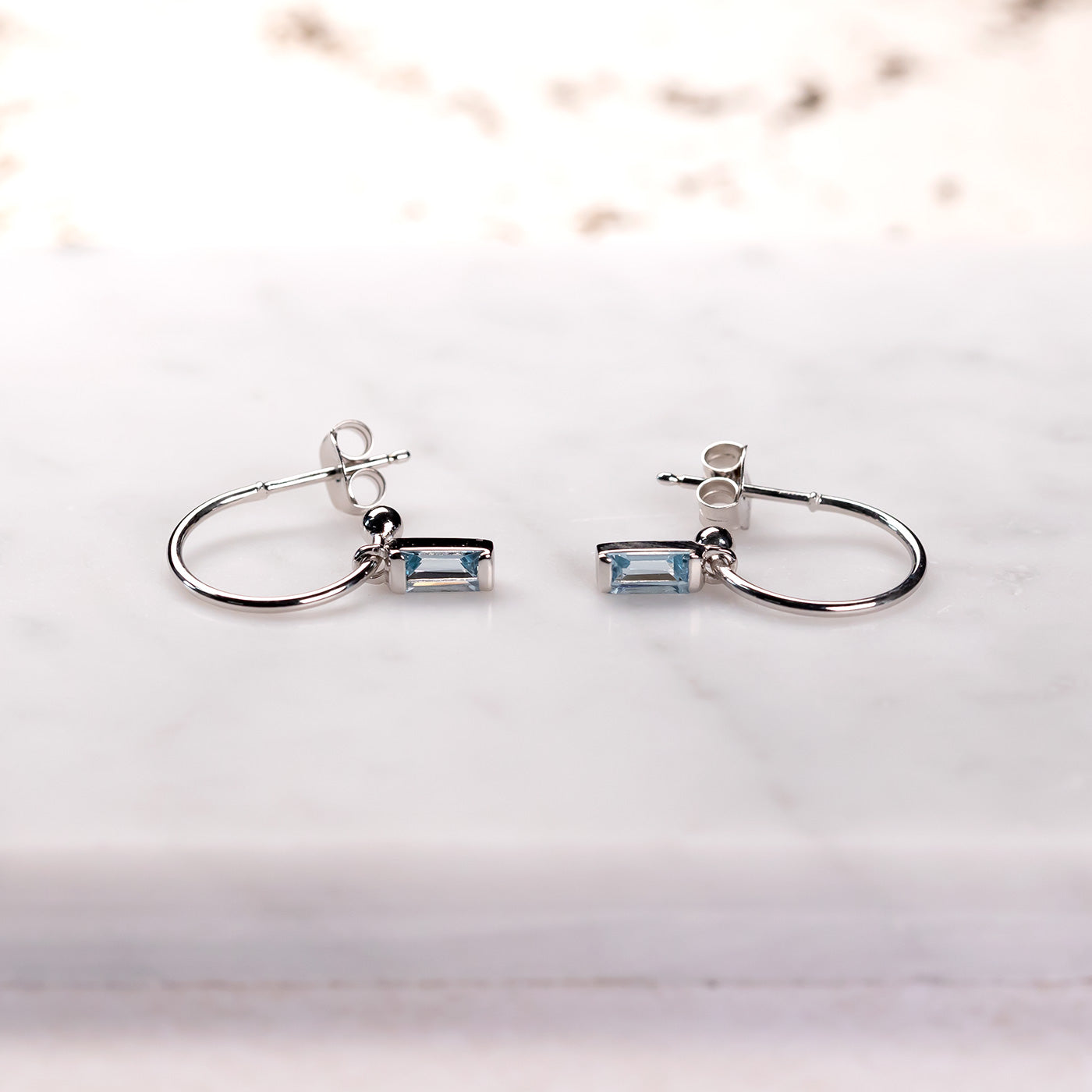 Sterling Silver Blue Topaz Baguette Mini Hoop Earrings