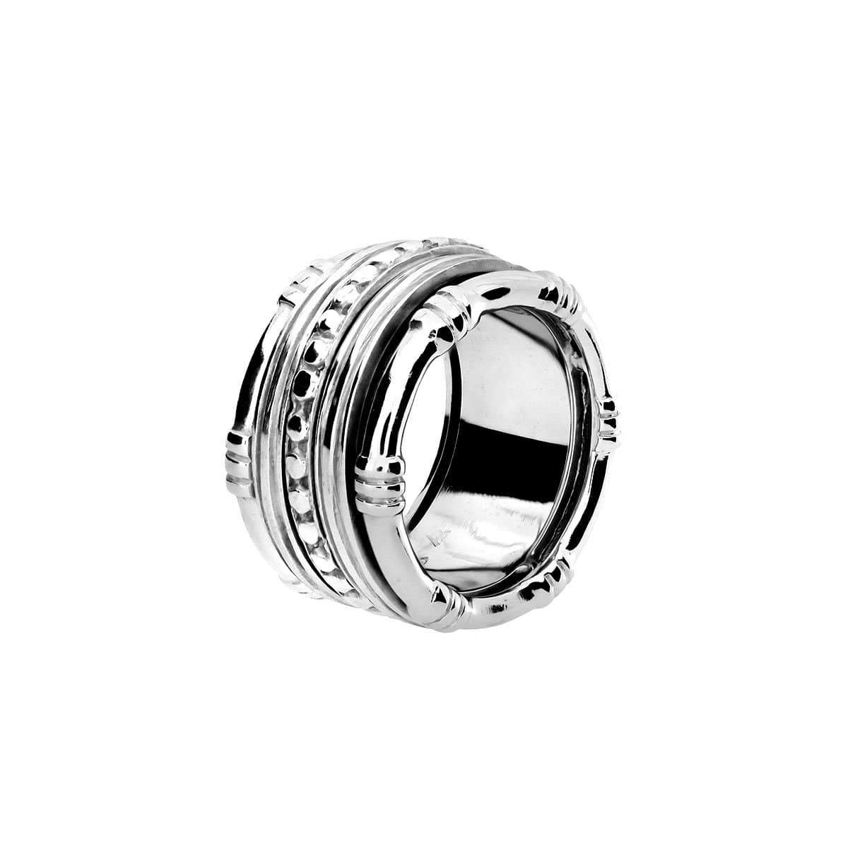 Sterling silver spinning ring featuring a sculptural bamboo-inspired design with textured and polished bands, showcasing a contemporary and refined silver jewellery style.