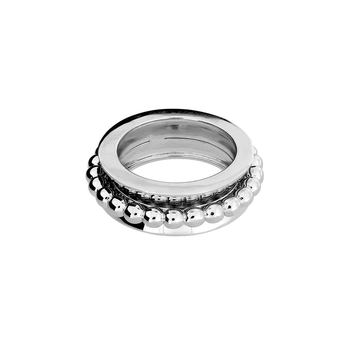 Sterling silver ring featuring a smooth band combined with a beaded spinning outer ring, showcasing a contemporary sculptural design in polished silver jewellery.