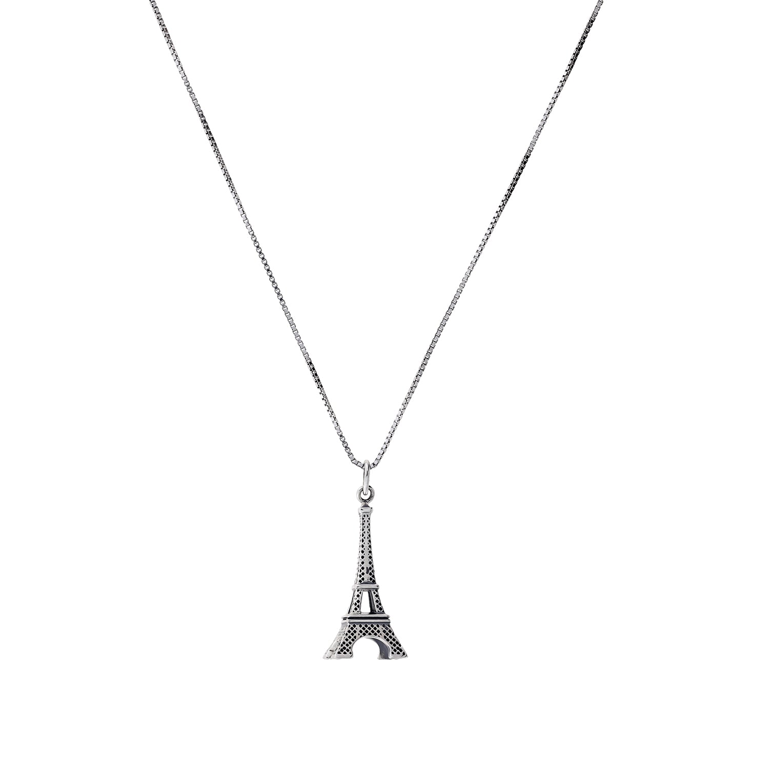 Sterling silver necklace featuring a finely detailed Eiffel Tower pendant suspended from a delicate chain, showcasing contemporary sculptural design by a British jeweller.