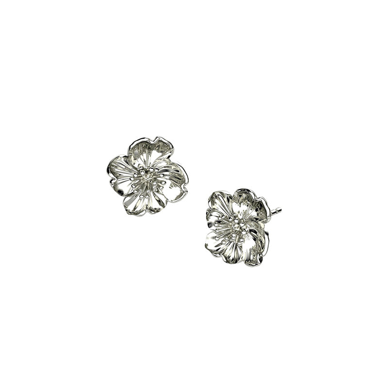Sterling silver earrings sculpted as detailed primrose flowers, showcasing delicate petal textures in a contemporary design measuring approximately 1cm in diameter.