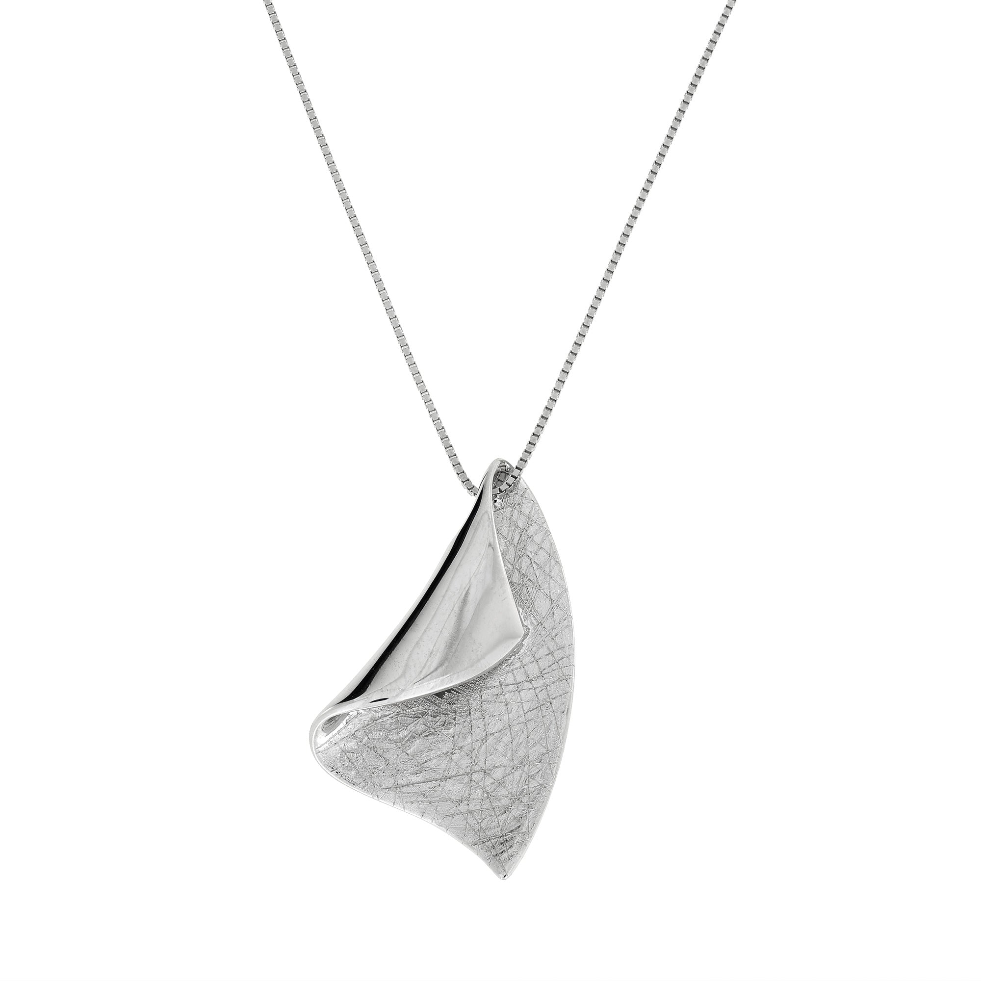 Sterling silver pendant with a sculptural folded leaf design combining polished and textured surfaces, suspended on a delicate fine chain for modern elegant silver jewellery.