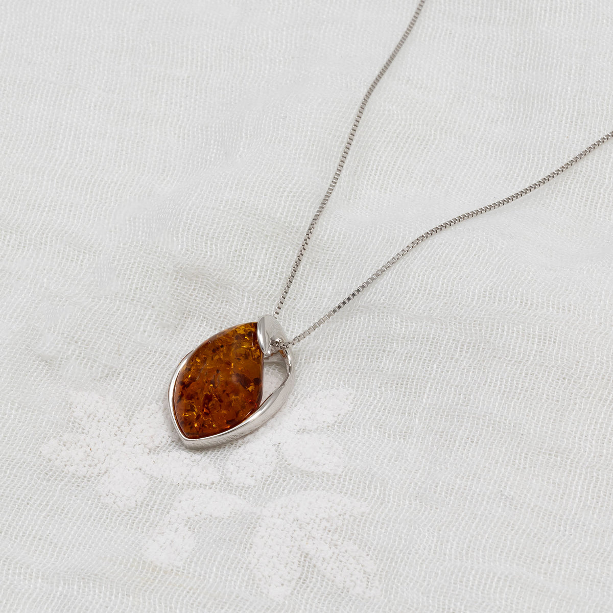 Silver Twist Amber Teardrop Pendant