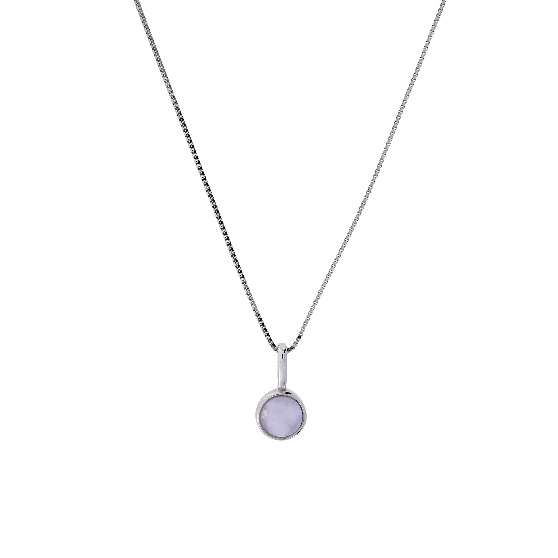 Delicate sterling silver pendant featuring a round moonstone set in a minimalist bezel, suspended from a fine chain for an elegant and timeless silver jewellery piece.