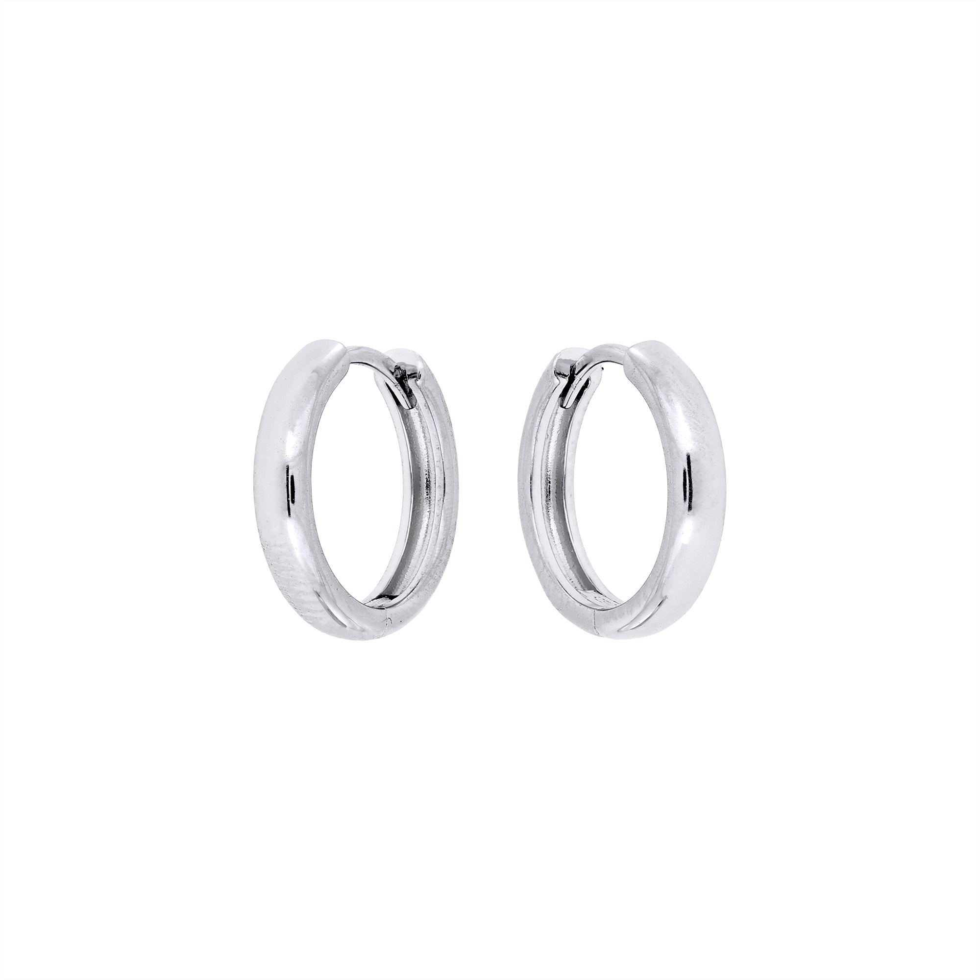 Small rounded sterling silver hoop earrings with a polished finish and hinged closure, offering a minimalist and timeless design in fine silver jewellery.
