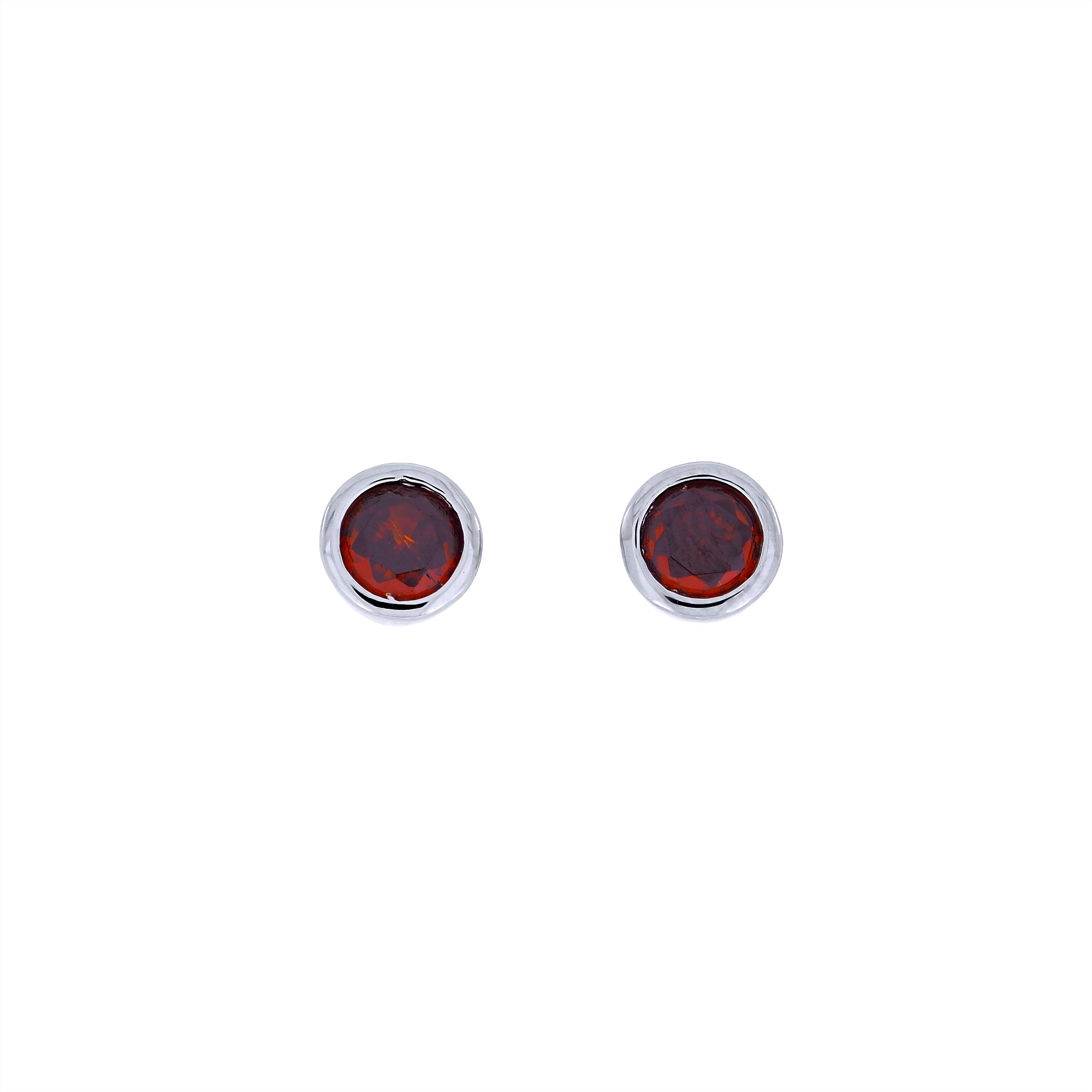Pair of polished sterling silver stud earrings showcasing deep red garnet gemstones, designed with a clean, modern setting for everyday elegance.
