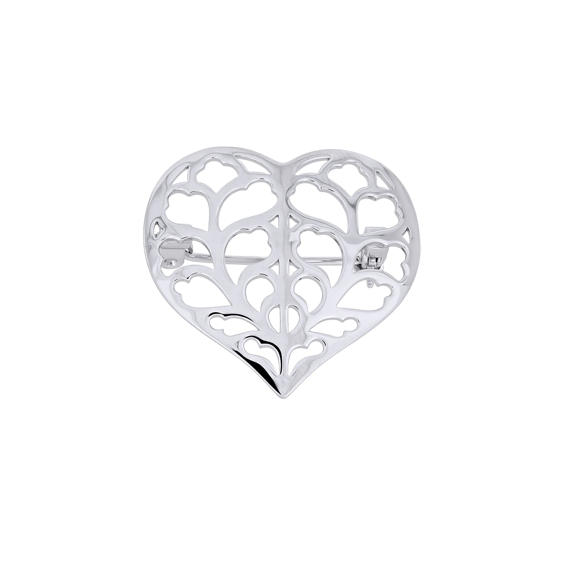 Sterling silver brooch in a sculptural heart shape with intricate openwork inspired by Yorkshire floral motifs, showcasing expert British craftsmanship.
