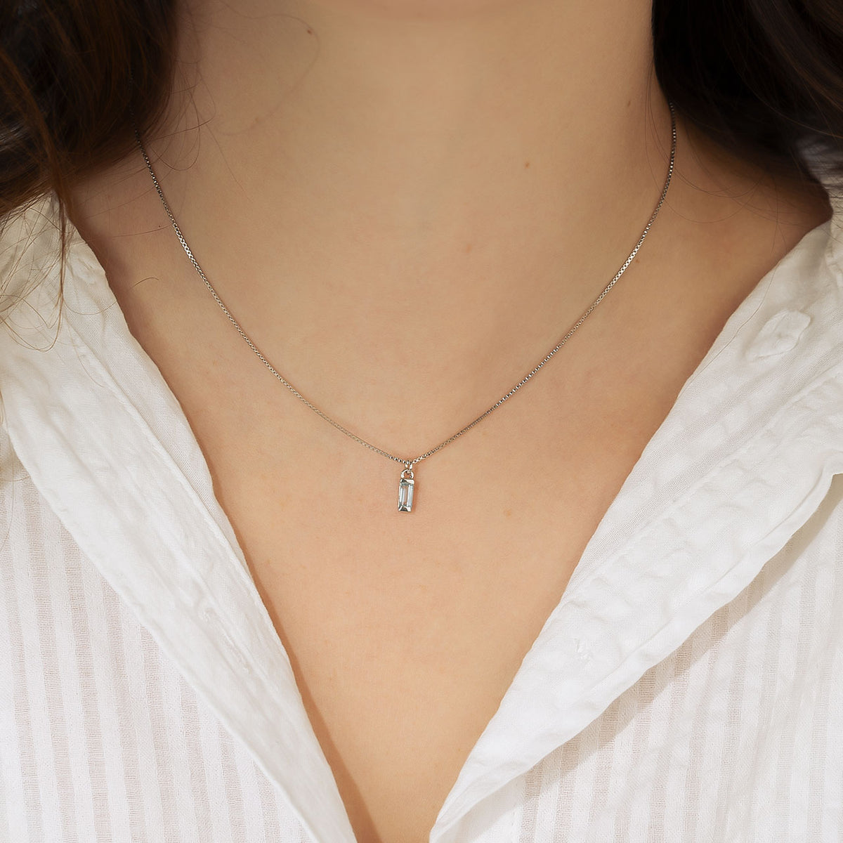 Sterling Silver Blue Topaz Baguette Pendant