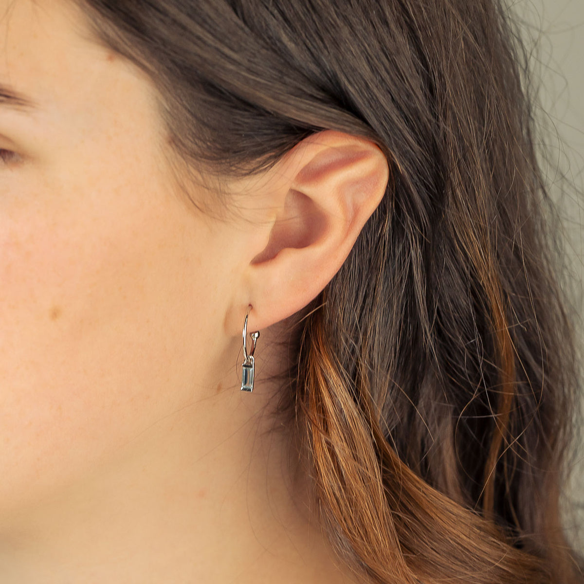 Sterling Silver Blue Topaz Baguette Mini Hoop Earrings