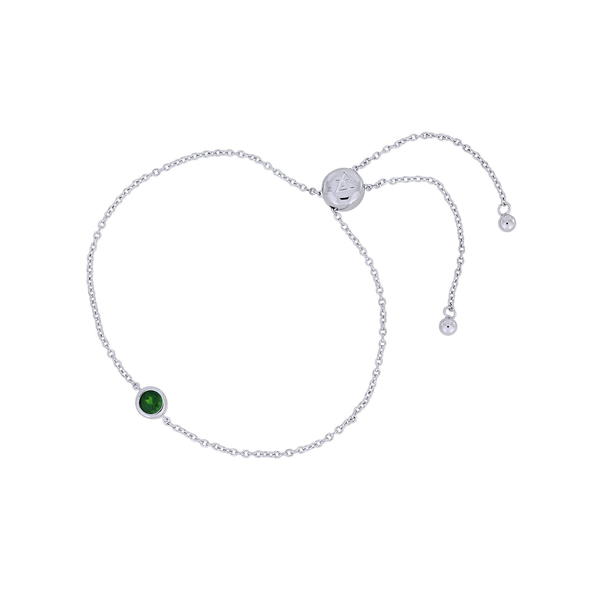 Delicate sterling silver adjustable bracelet featuring a single vibrant Siberian emerald gemstone, showcasing expert British craftsmanship with a sleek, minimal design.
