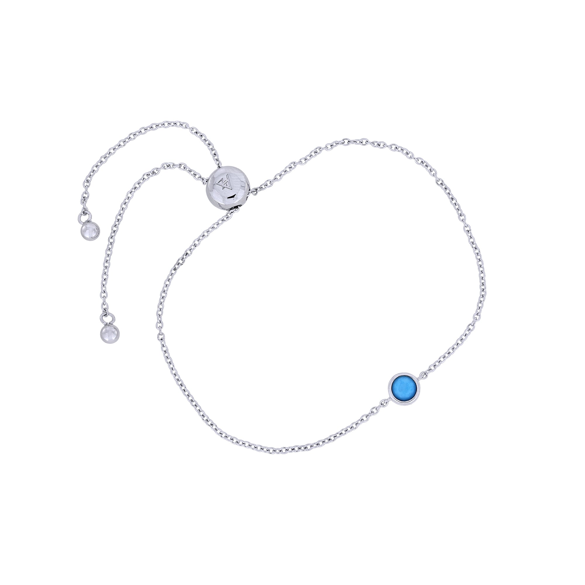 Adjustable sterling silver bracelet featuring a single round turquoise stone set in a minimalist bezel, exemplifying contemporary British craftsmanship by Azendi.