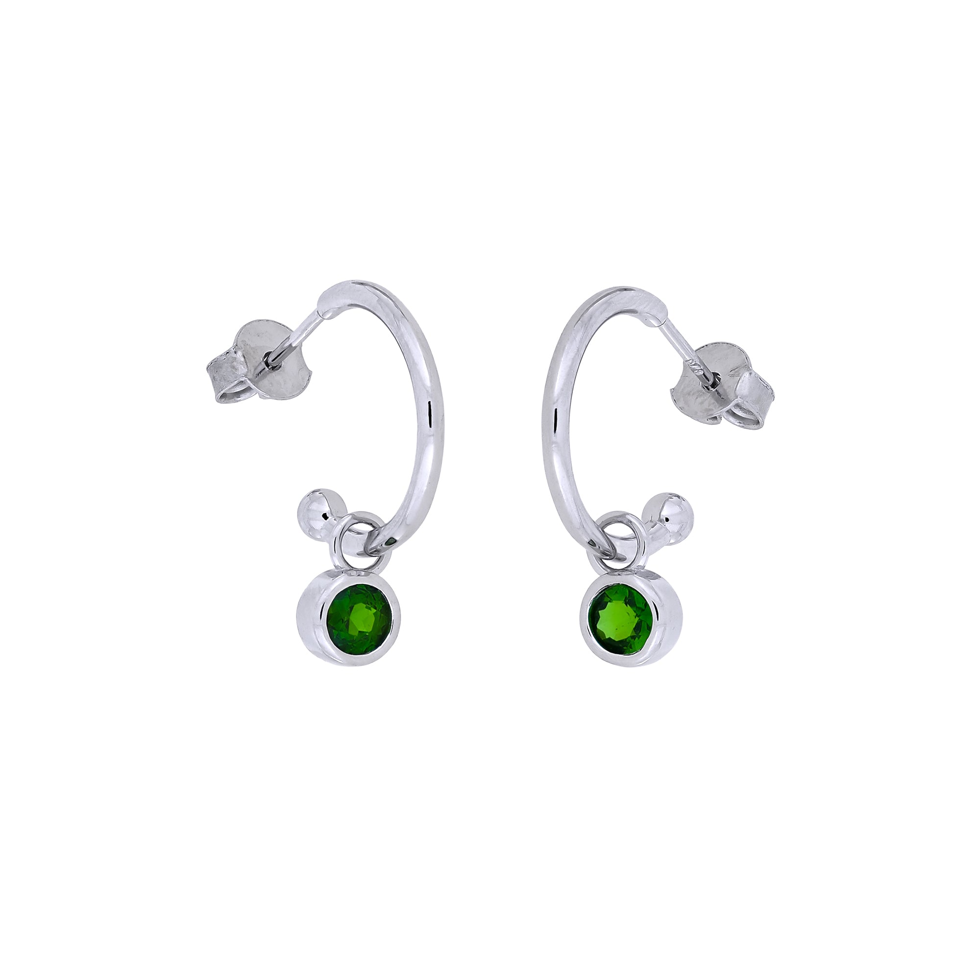 Pair of sterling silver hoop earrings featuring a sculptural design with Siberian emerald birthstone charms, reflecting expert British craftsmanship by Azendi.