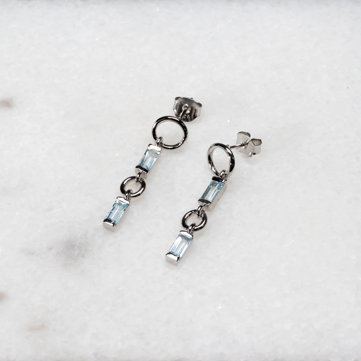 Silver Blue Topaz Baguette Drop Earrings