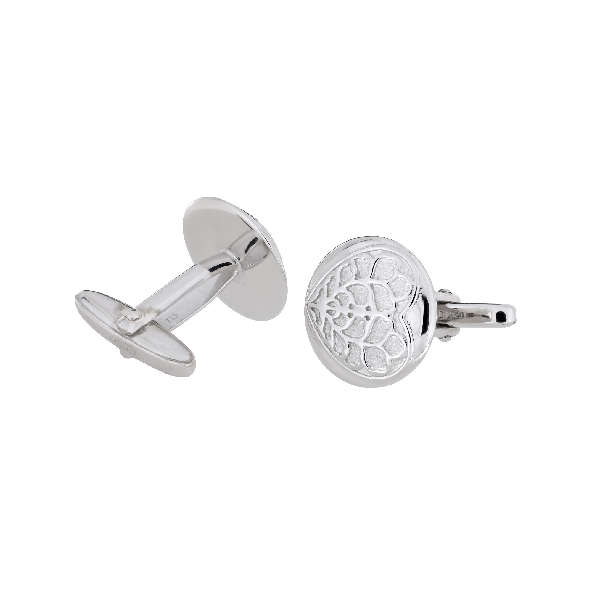 Pair of round sterling silver cufflinks engraved with a sculptural Heart of Yorkshire motif, showcasing expert British craftsmanship in contemporary silver jewellery design.