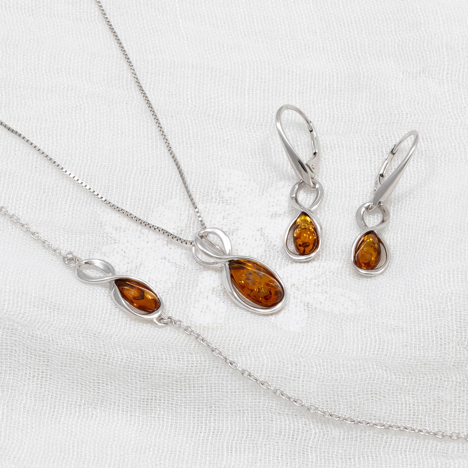 Silver Infinity Amber Pendant
